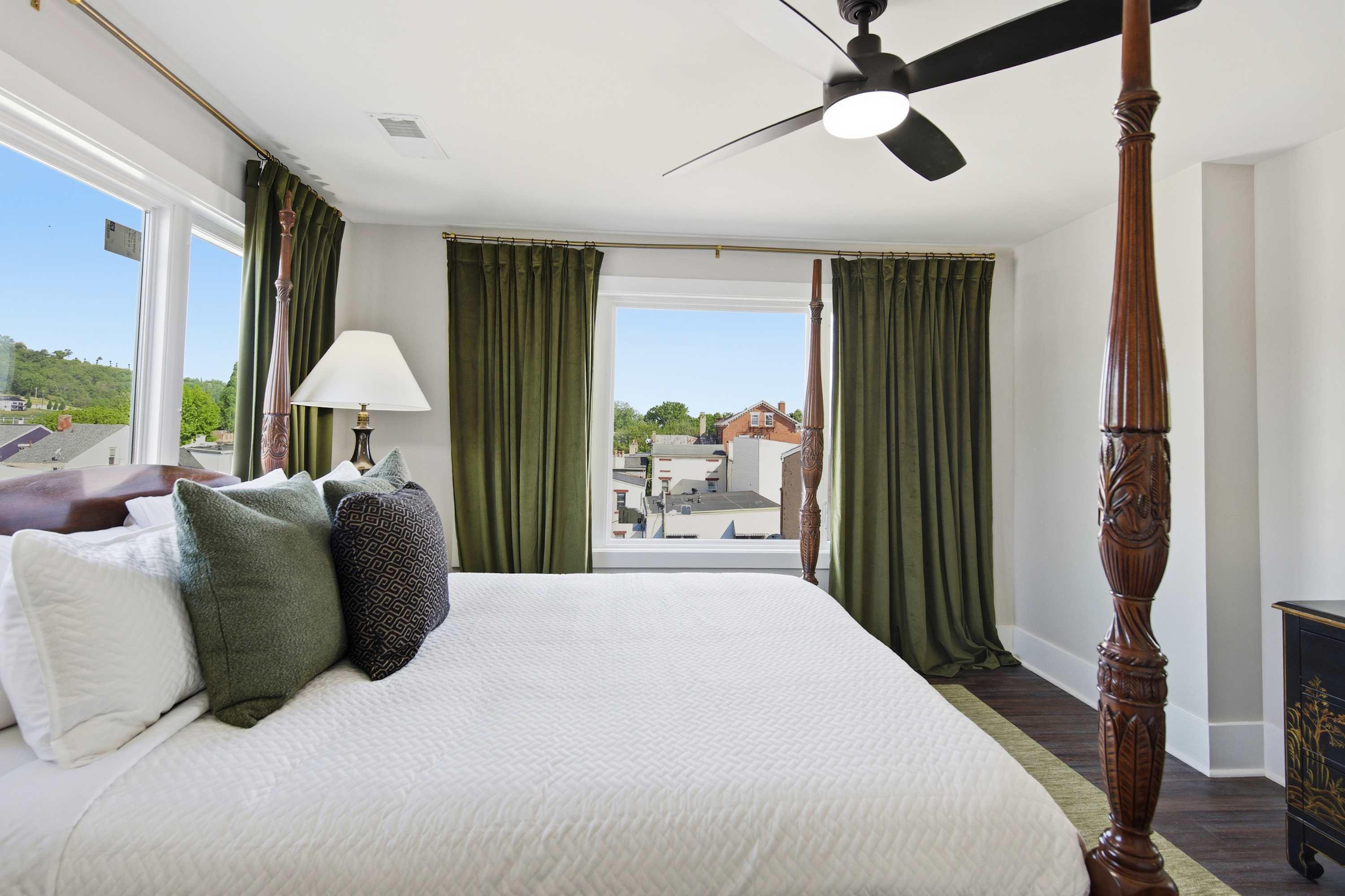 Recharge in the bedroom retreat, offering a stately queen bed​