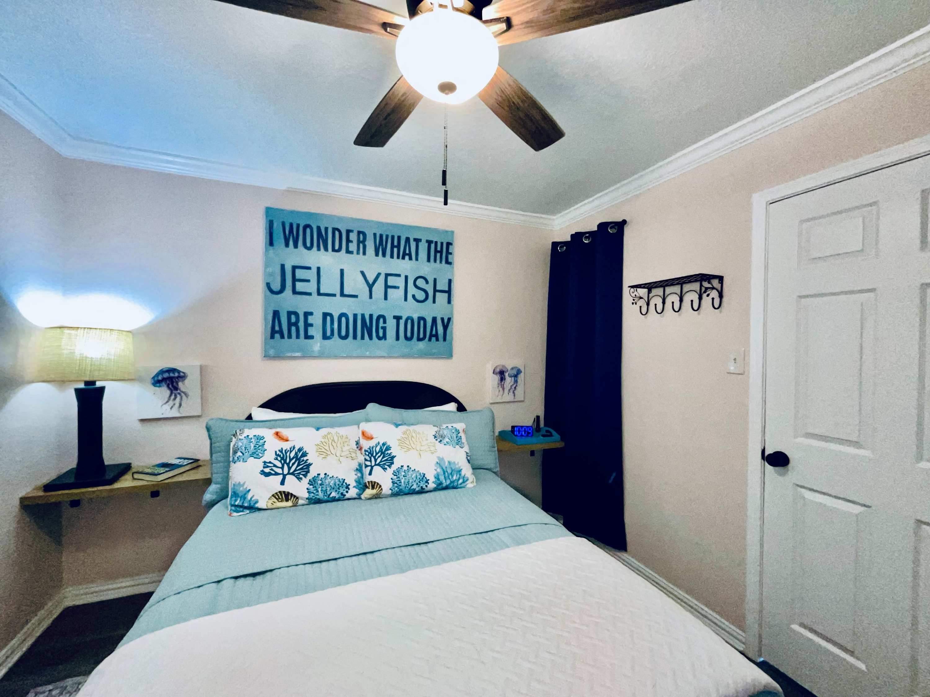 Recharge in the bedroom retreat, offering a queen bed & TV​