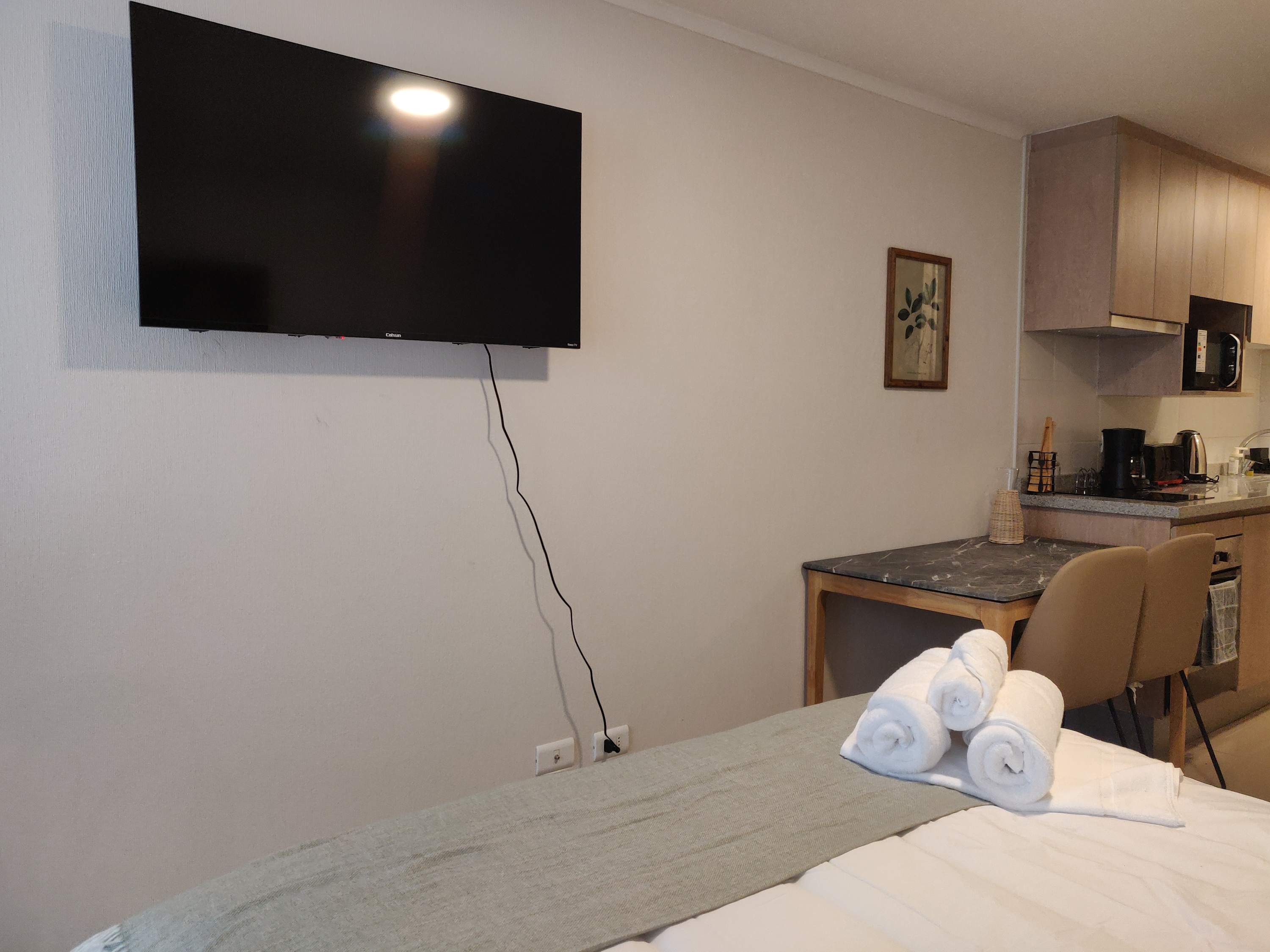 Cozy studio with modern amenities, perfect for a relaxing stay in the heart of the city.