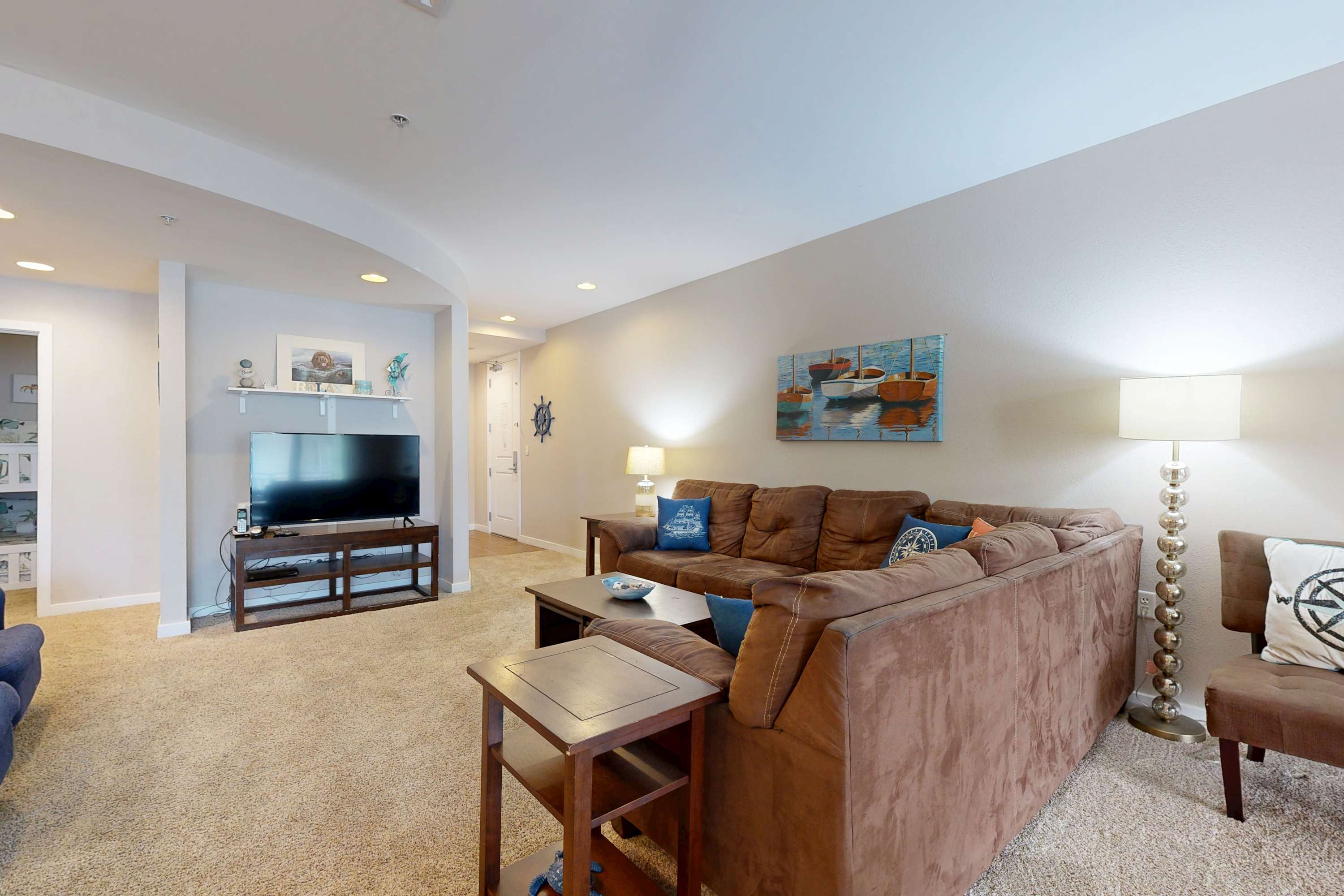 Top-floor corner courtyard home with pool, gym, & game system
