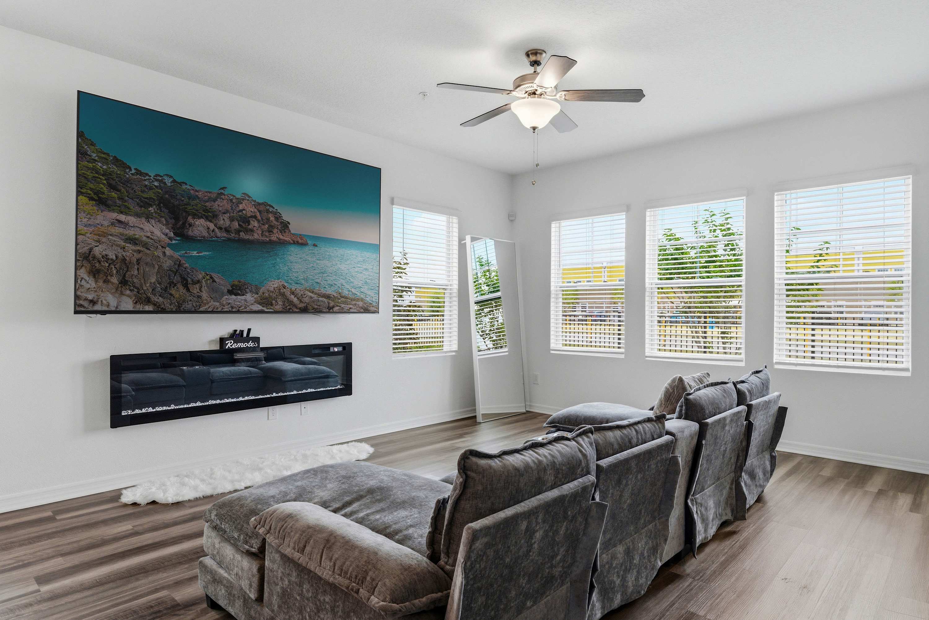 Relax in style with a spacious living area and a 100-inch Smart TV for the ultimate entertainment experience