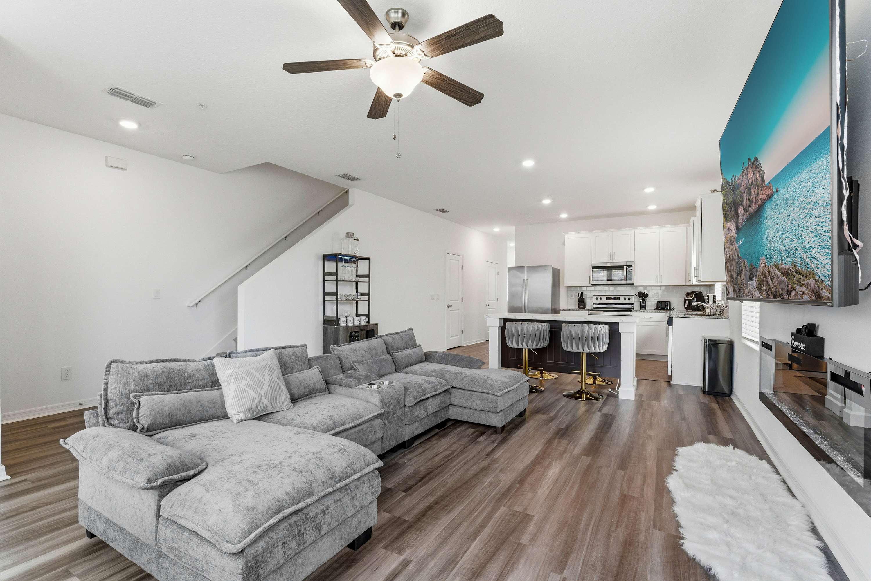 Relax in style with a spacious living area and a 100-inch Smart TV for the ultimate entertainment experience