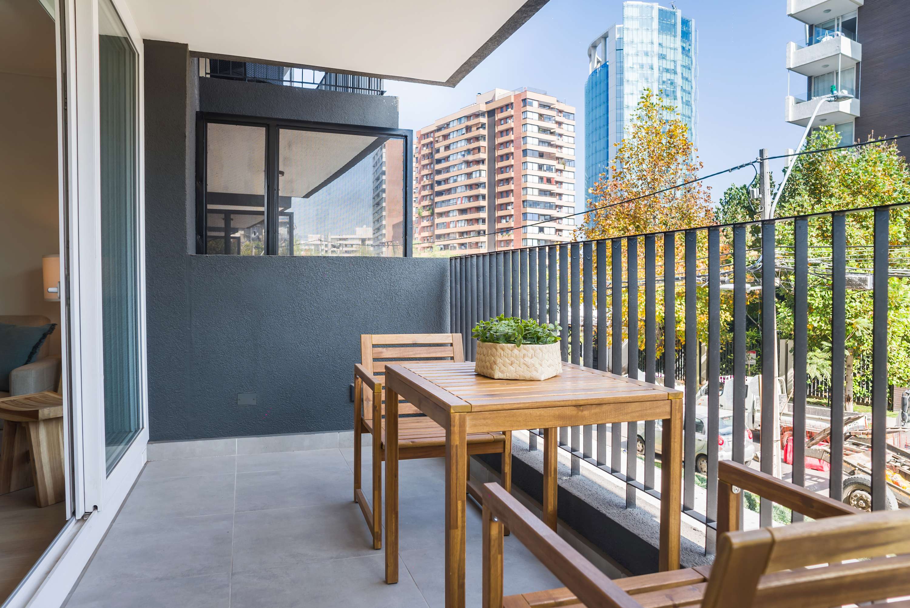Enjoy your morning coffee on this private balcony with stunning city views, perfect for relaxation.