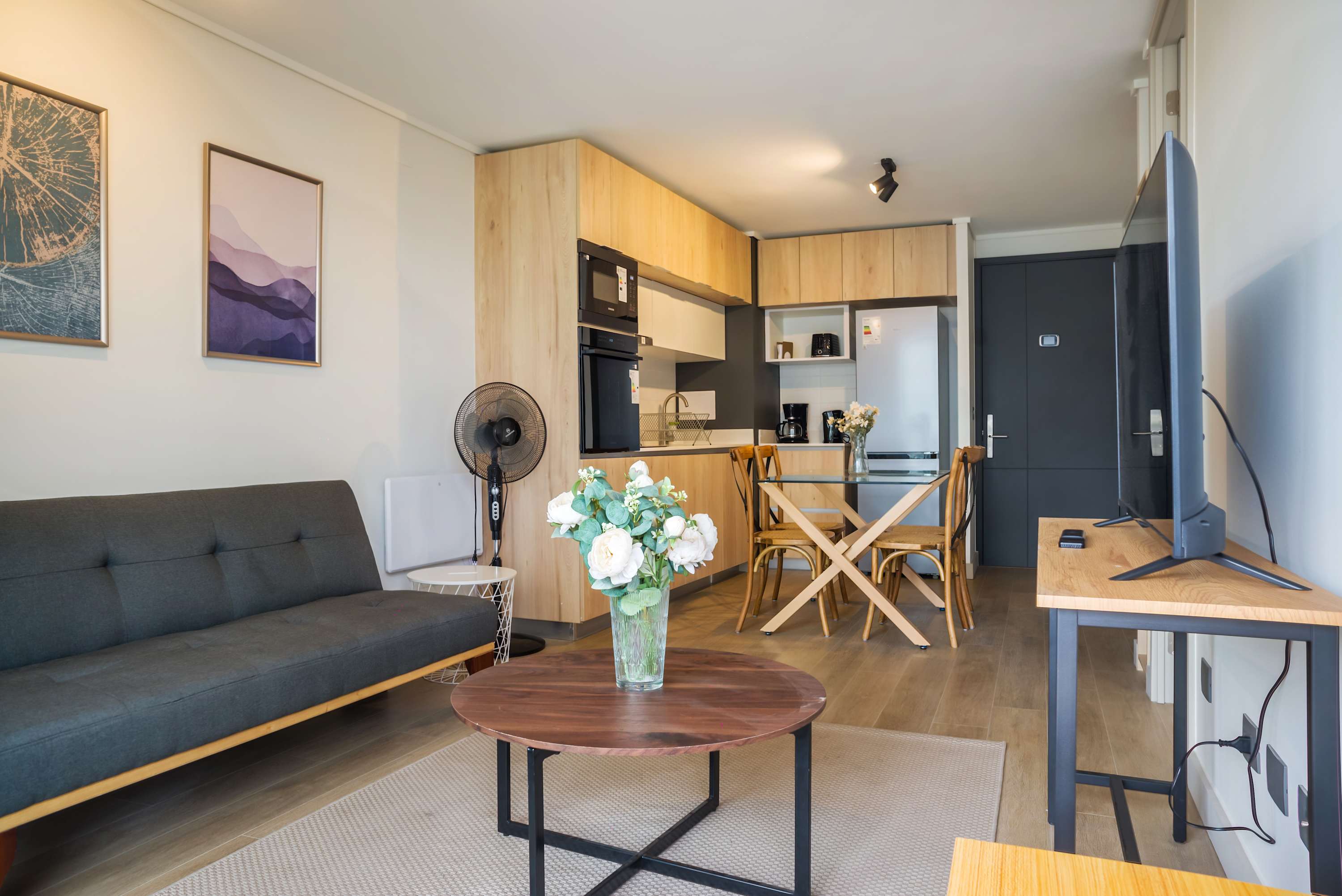Cozy studio with modern amenities and stylish decor, perfect for a comfortable stay in the heart of the city.