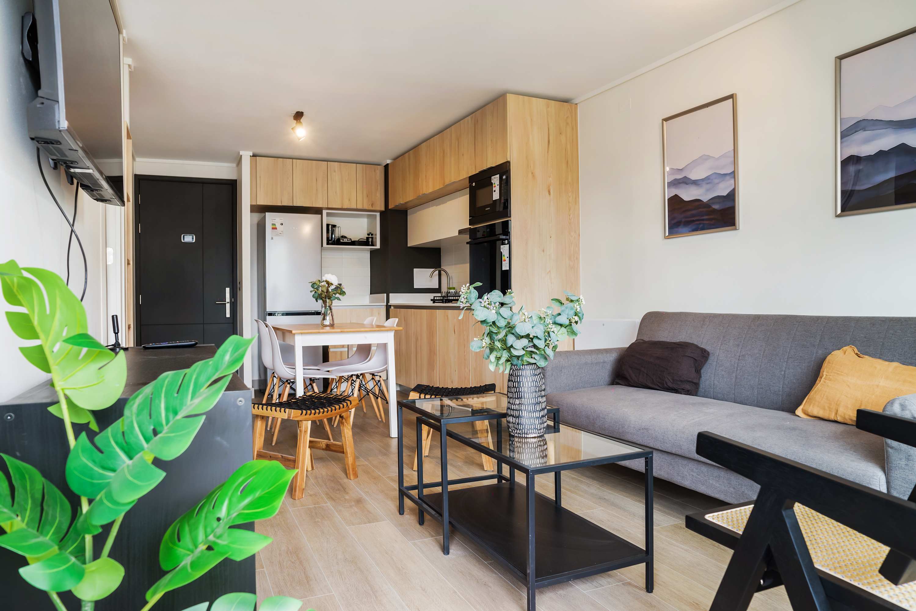 Cozy and stylish living area with modern amenities and a welcoming atmosphere, perfect for relaxation.