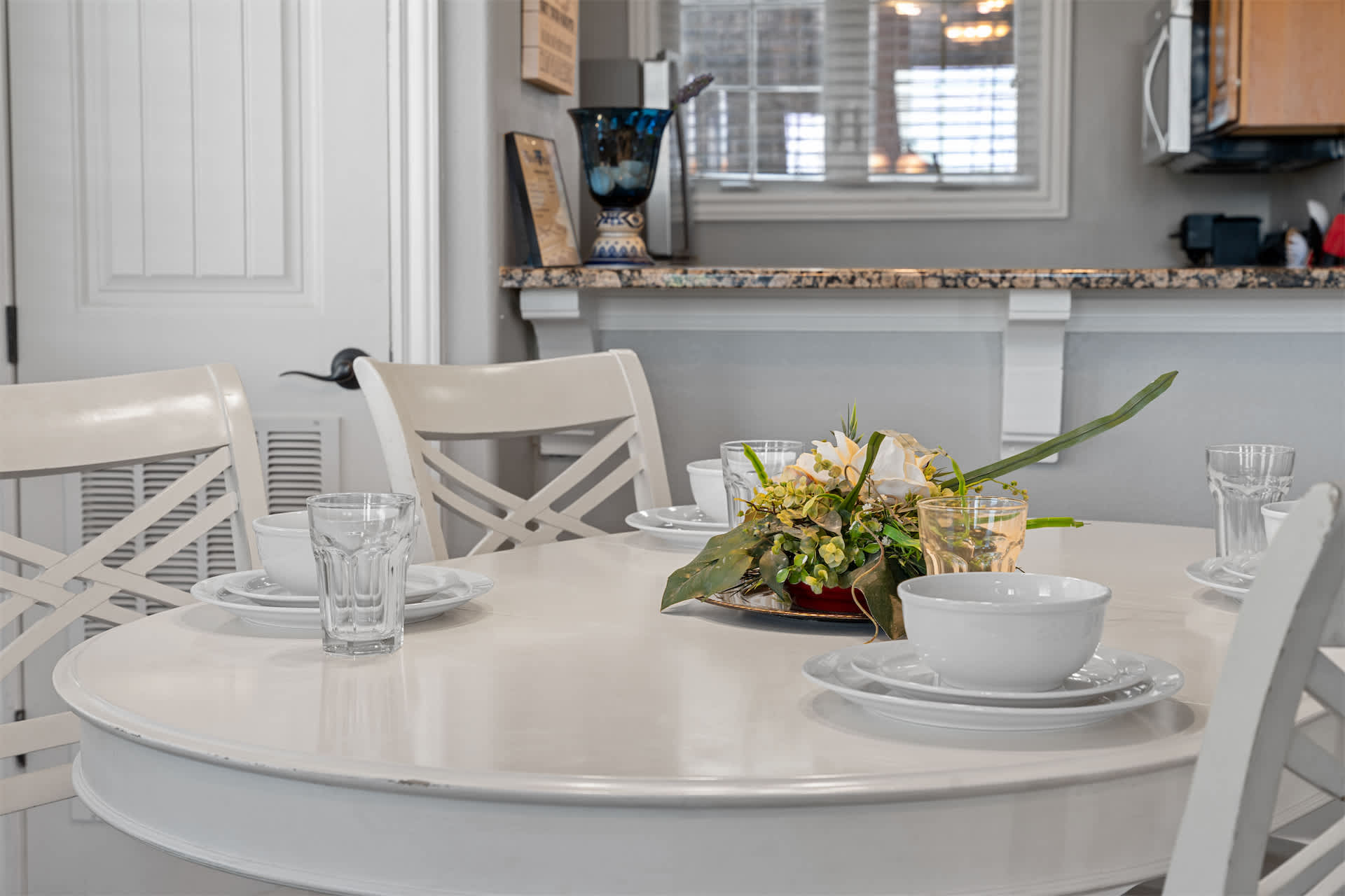 Gather for meals together at the dining table, seating 4​