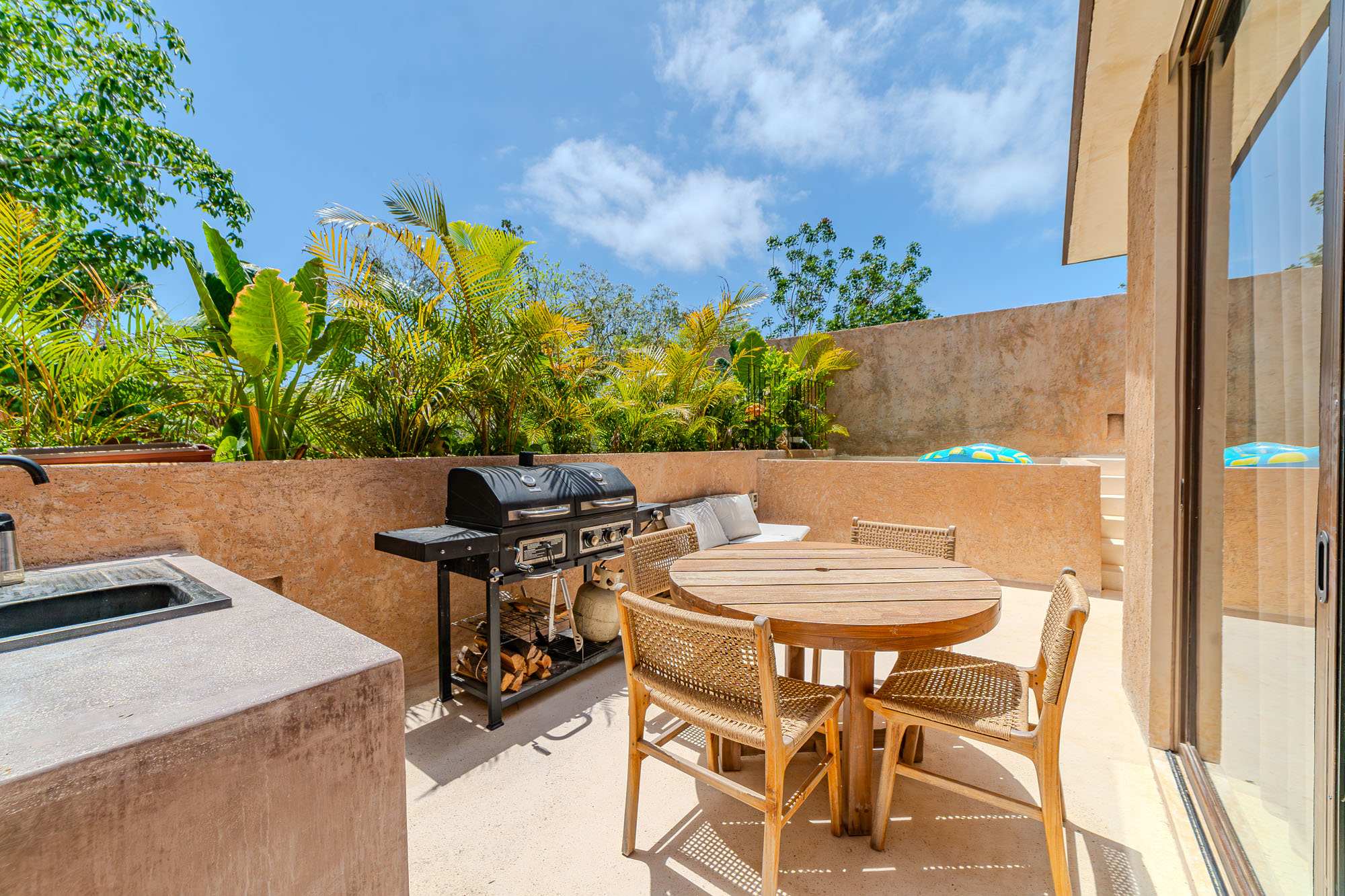 Enjoy the Tulum breeze from your private rooftop, ideal for lounging, grilling, and outdoor meals. + Plunge pool