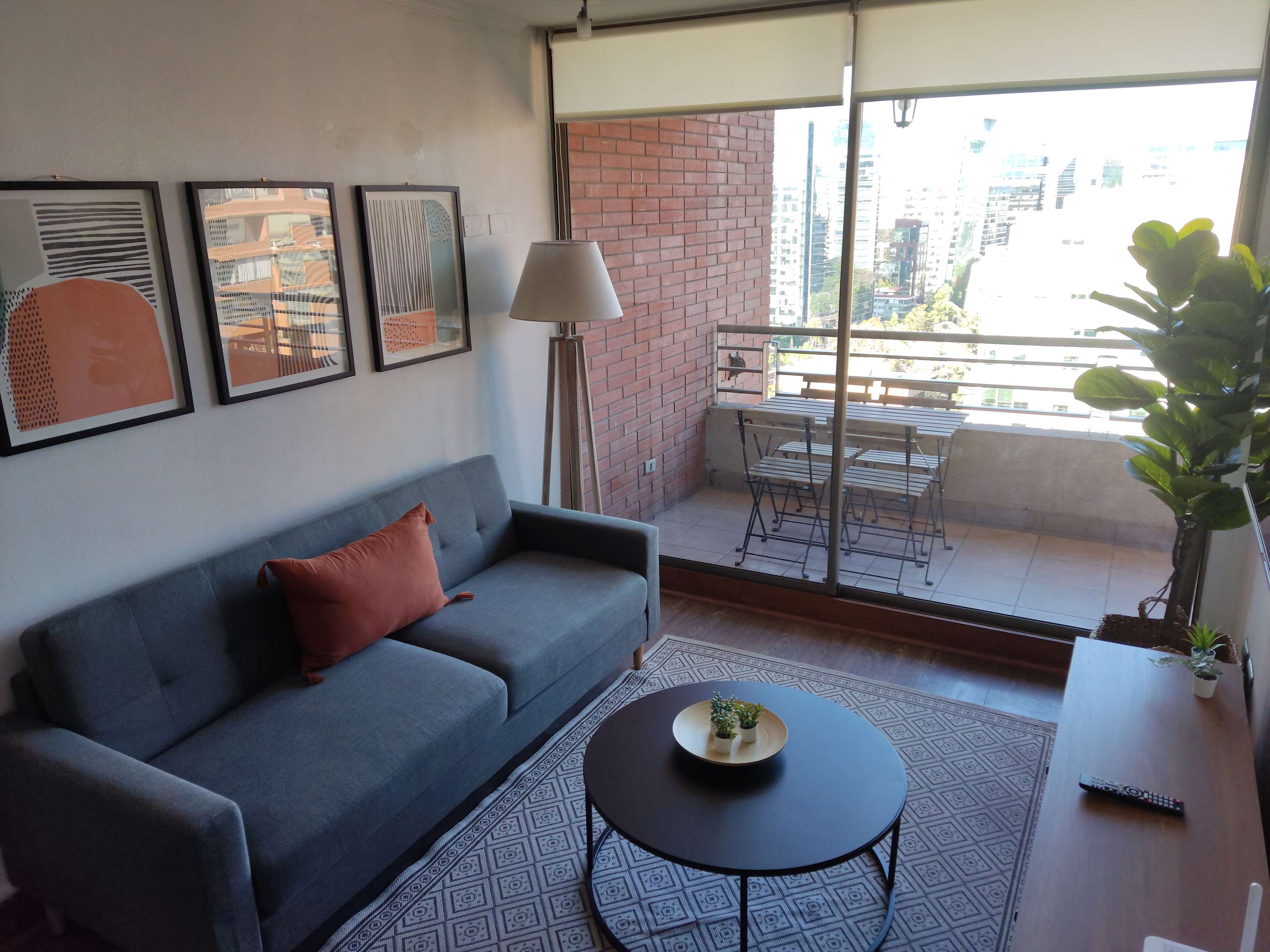 Relax in a stylish living room with a city view and private balcony access.