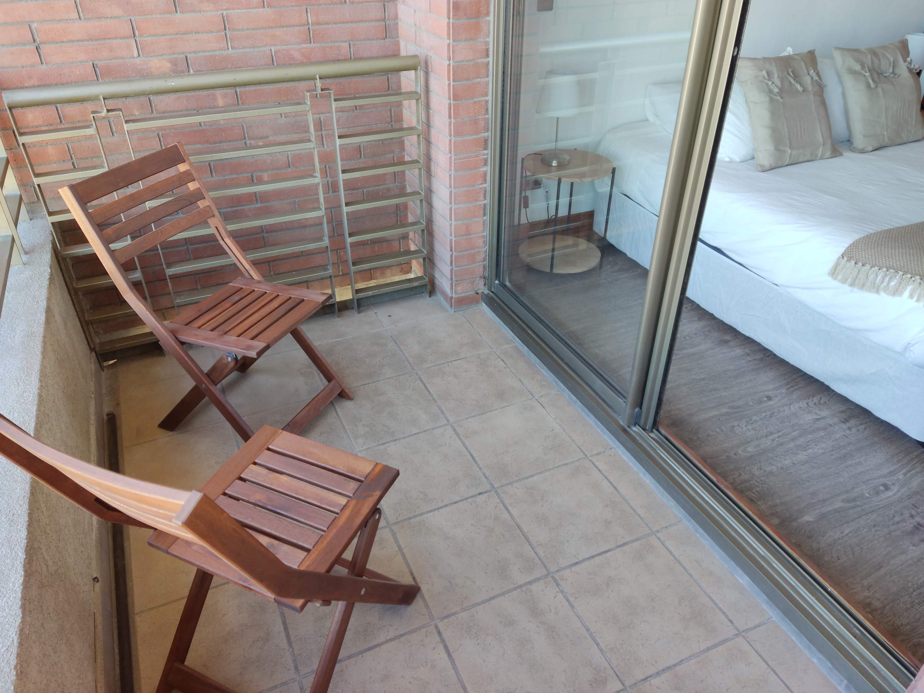 Relax on your private balcony with a morning coffee, enjoying the fresh air and views.