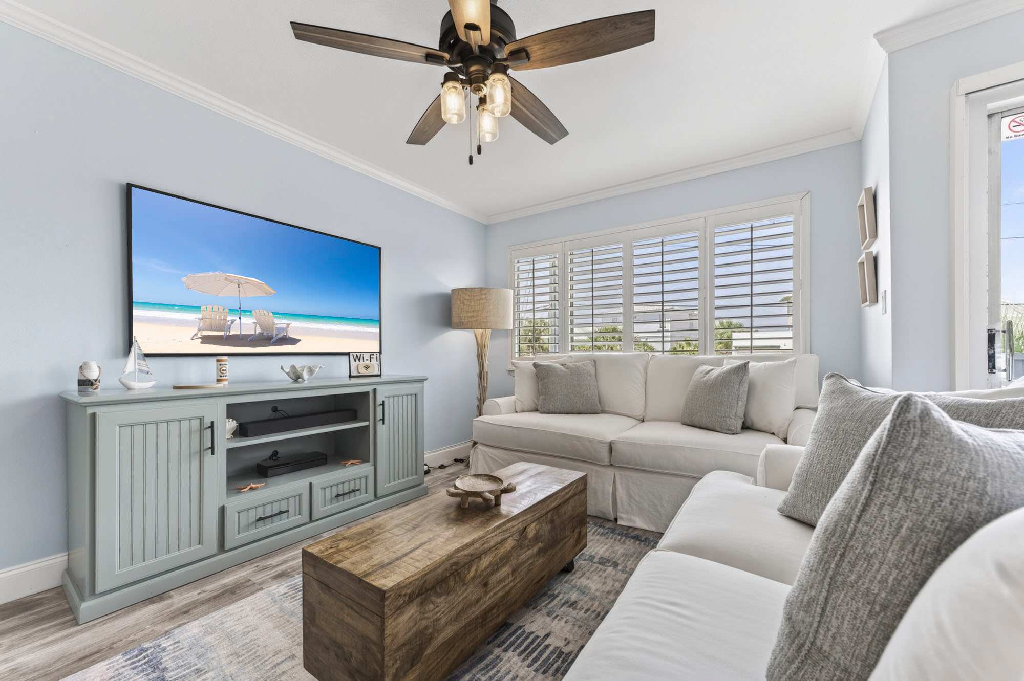 Curl up in the coastal living room & stream your favorites on the smart TV