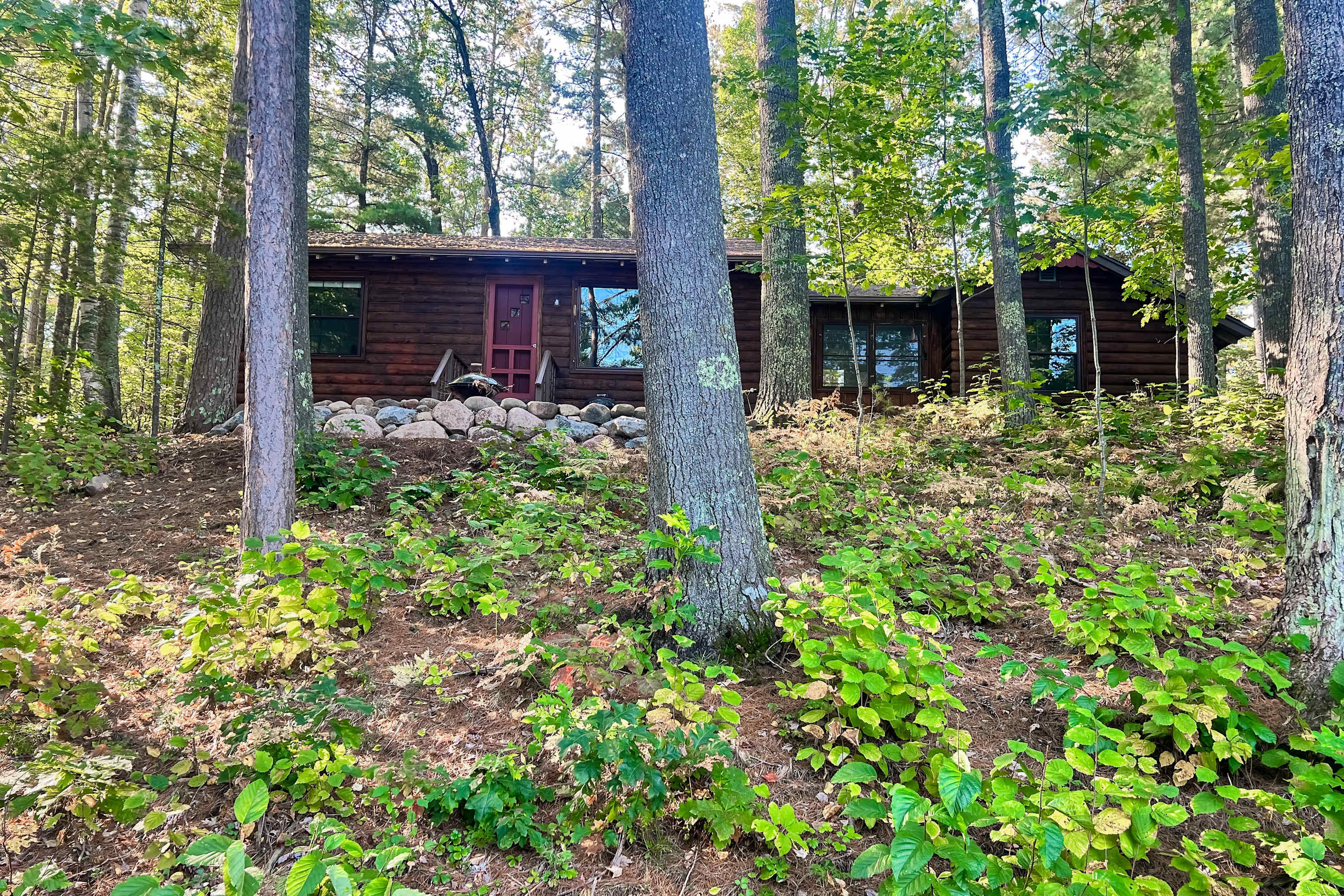 Lakefront escape on Rest Lake with dock, firepit & bike trail access