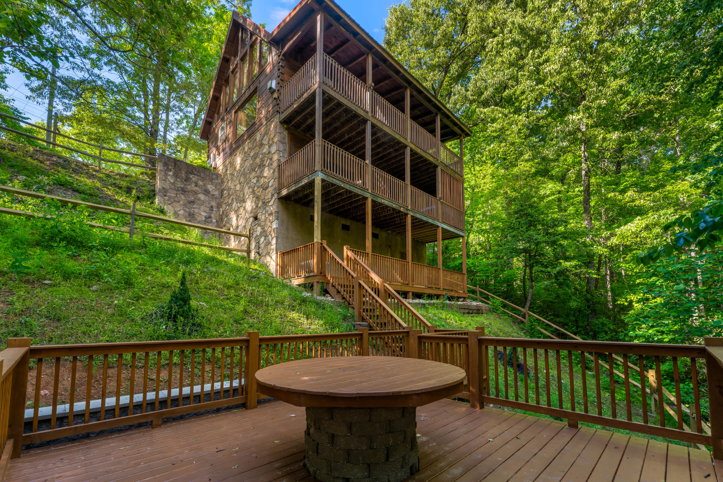 Spacious forest-view deck for gathering!