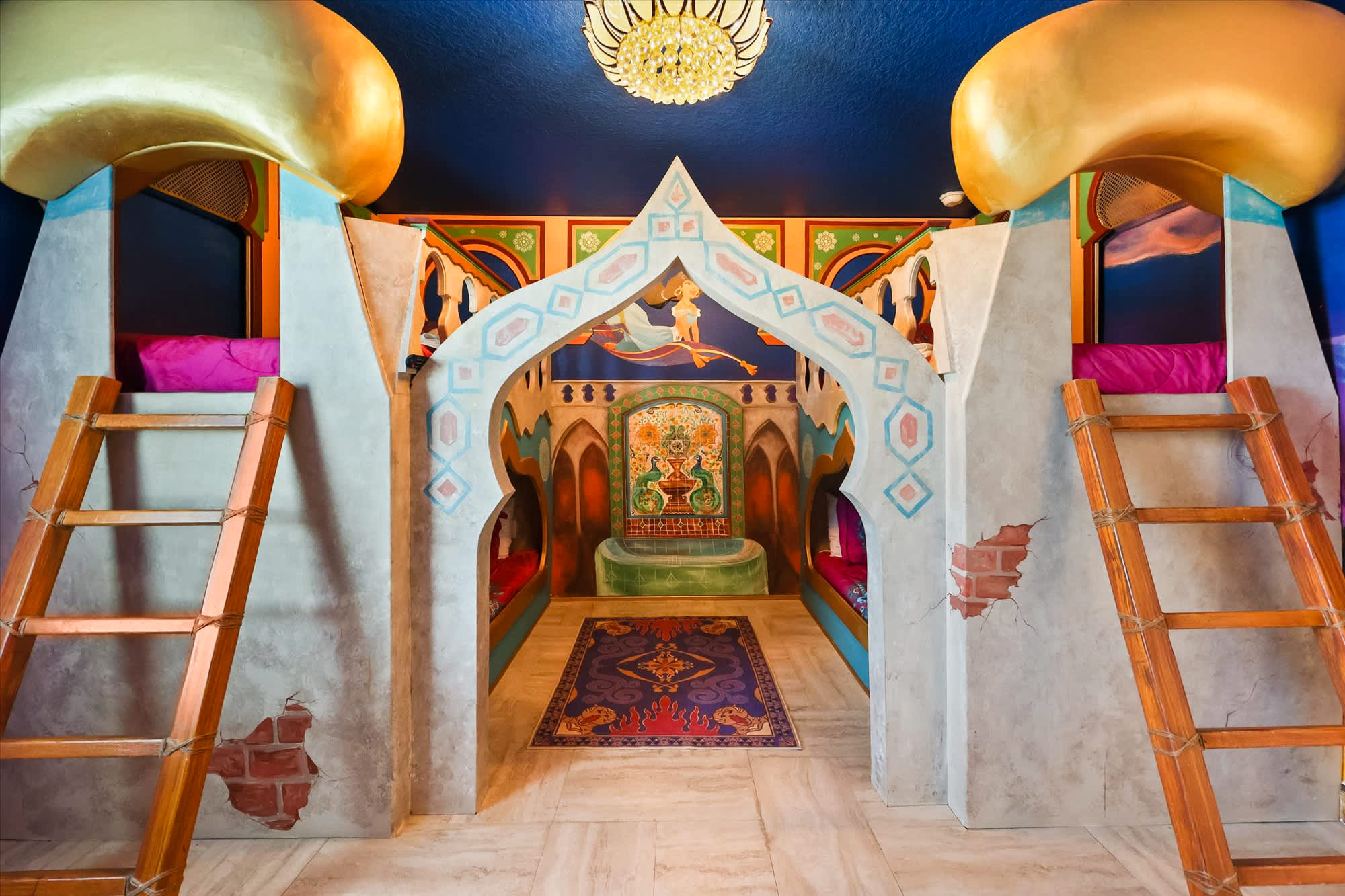Step into a magical world with this enchanting themed room, complete with cozy bunk beds and vibrant decor for unforgettable family adventures.
