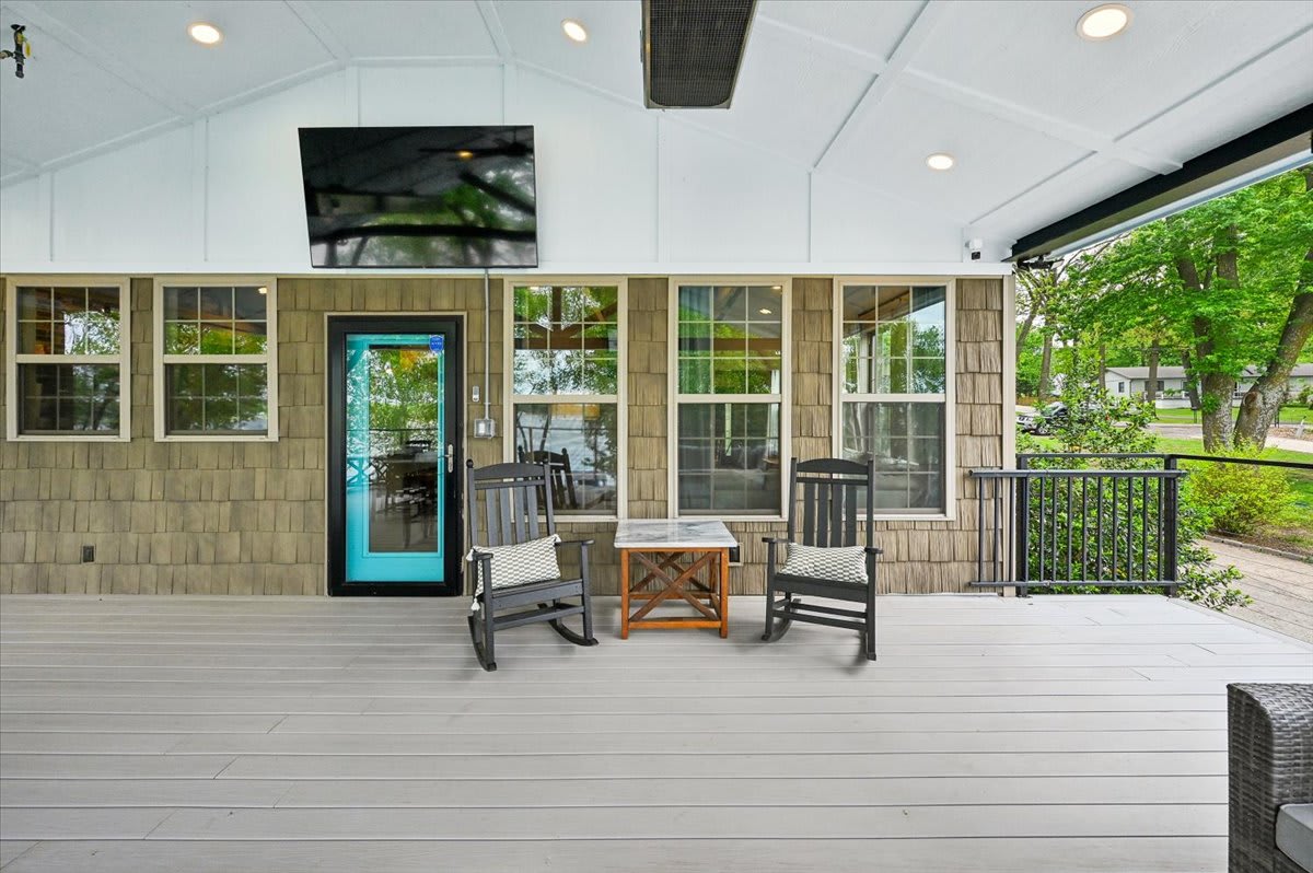 Covered, heated back deck, with TV. 