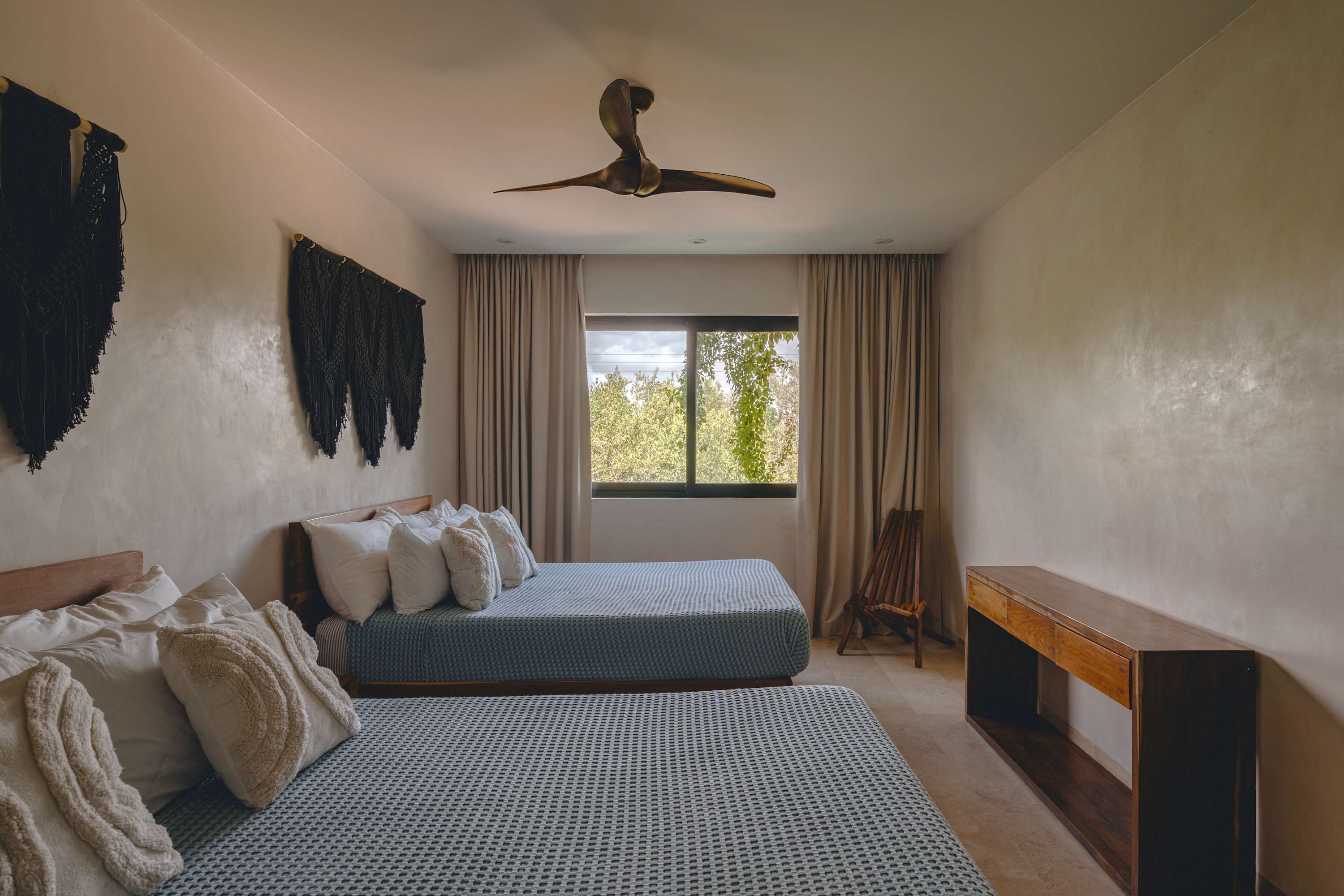 Beautiful bedroom with two comfortable double beds