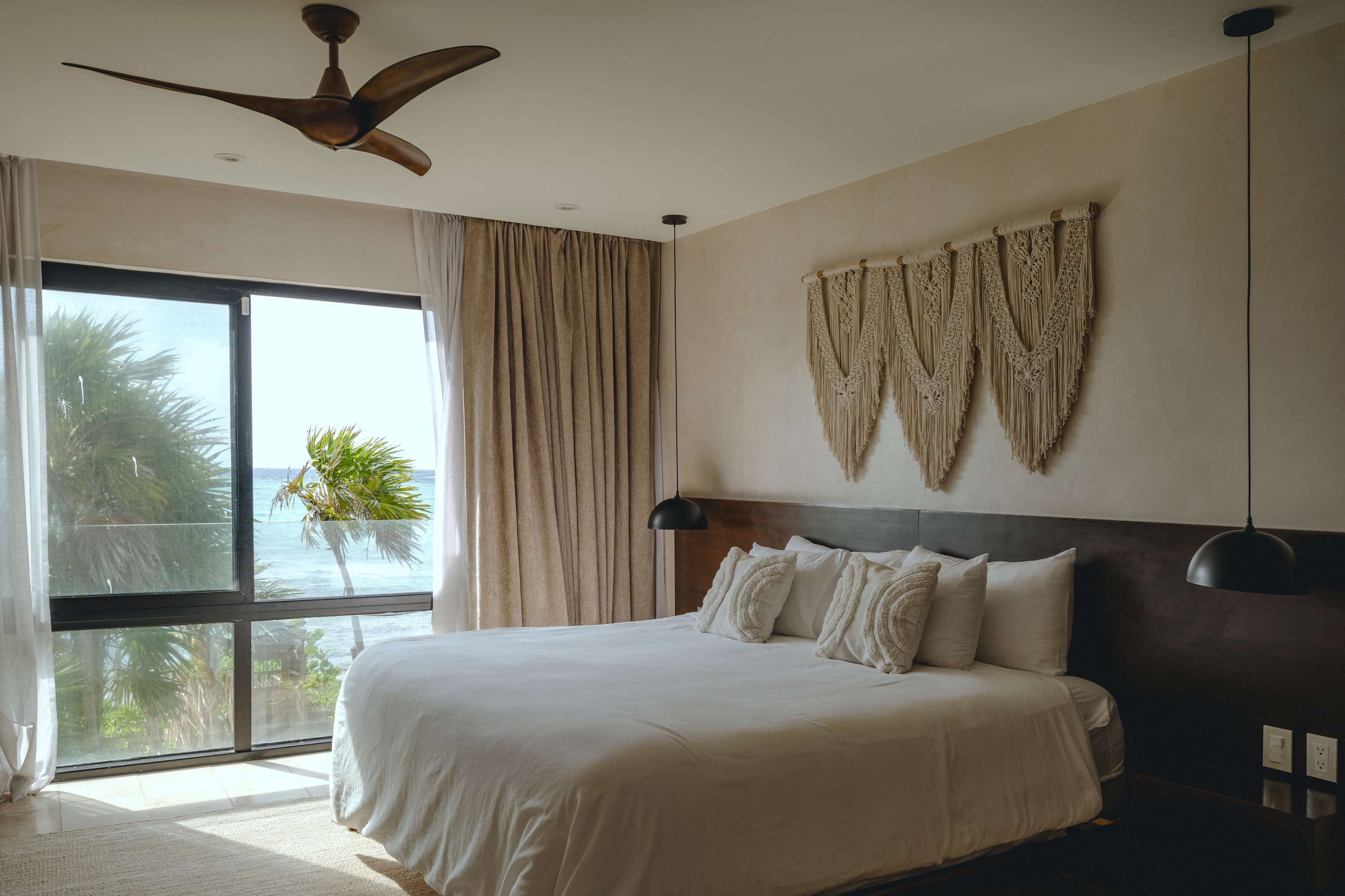 Modern and spacious bedroom with ceiling fan