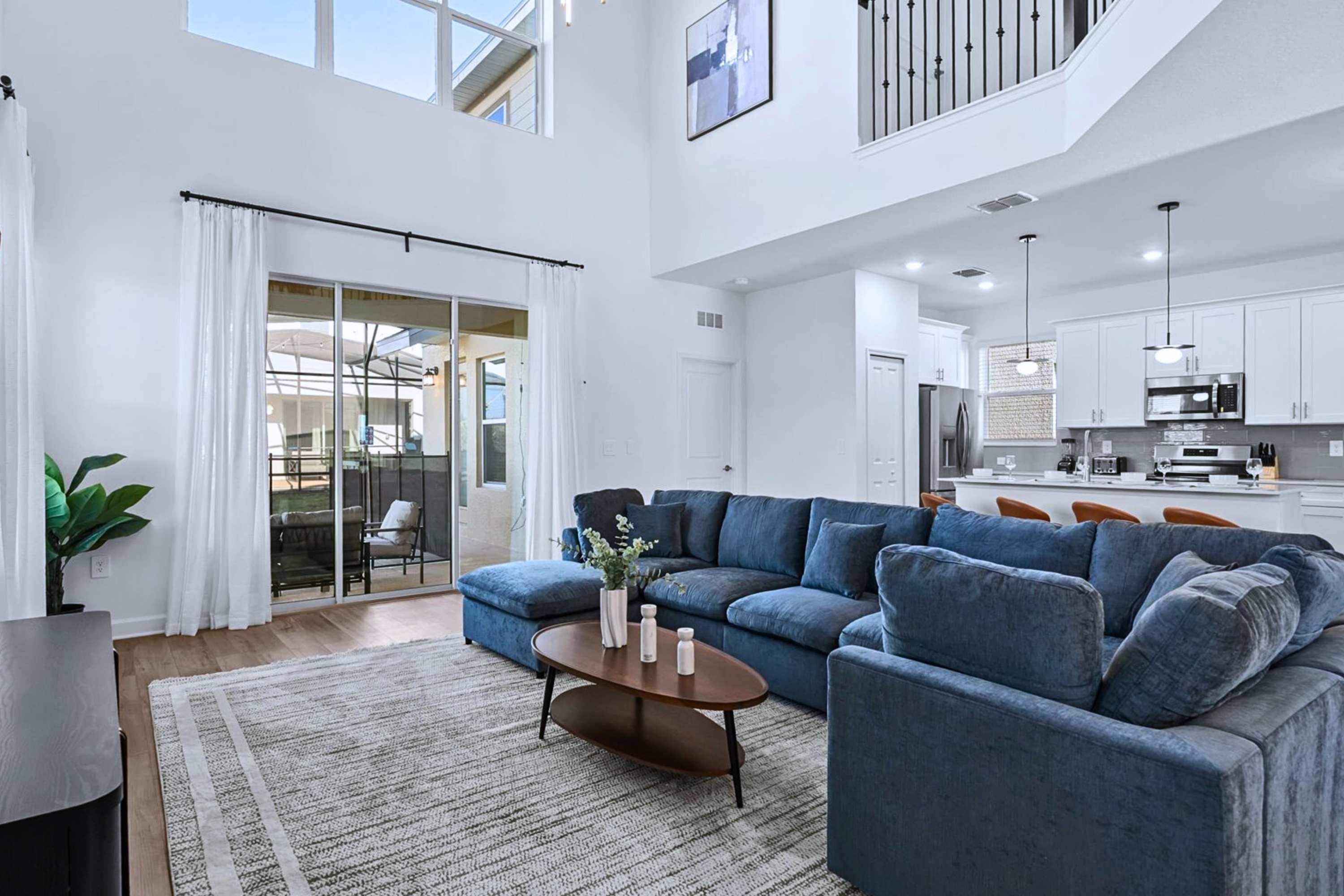 Main living room – Comfortable seating with soaring ceilings