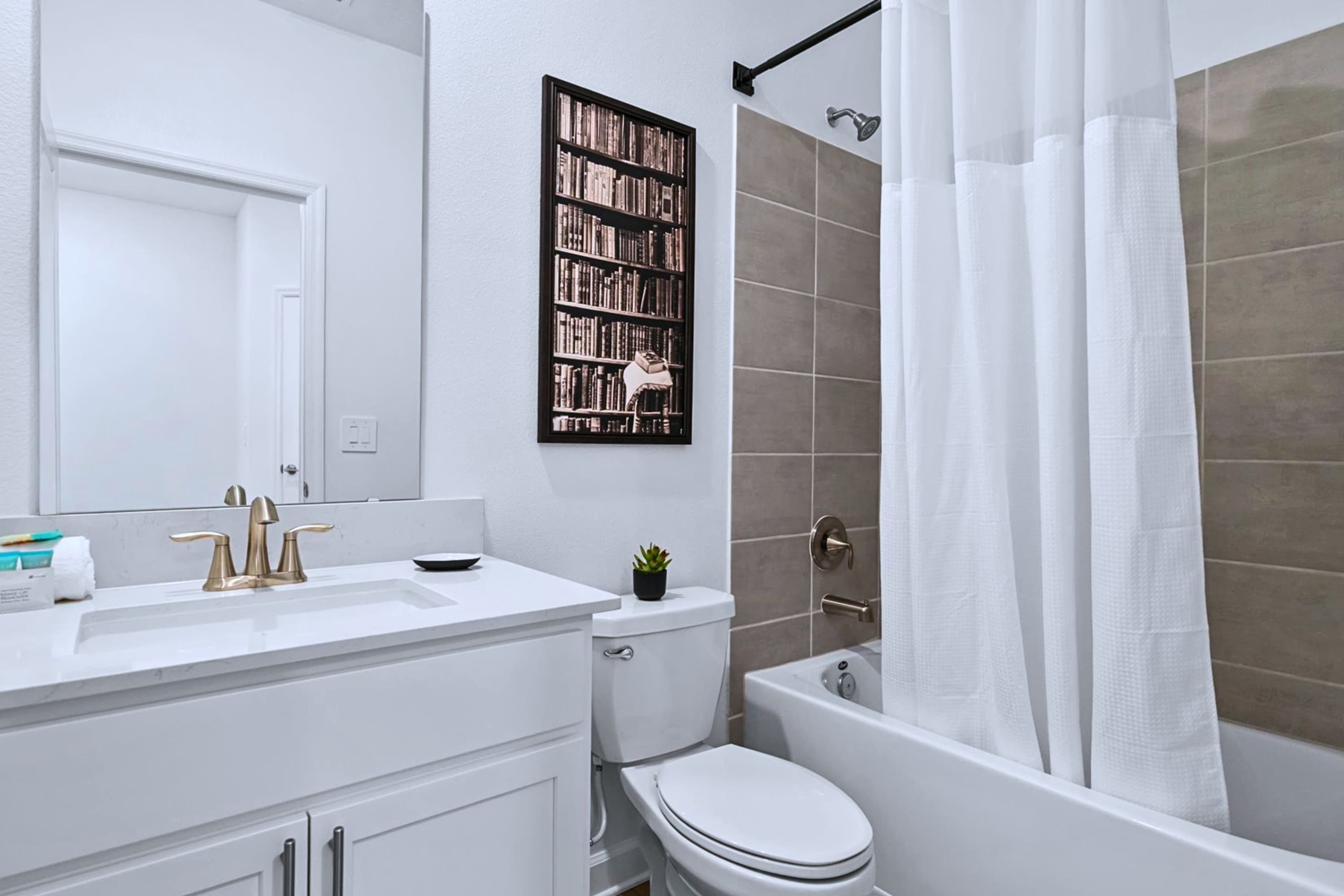 Modern bathroom – Fresh, bright, and thoughtfully designed with premium finishes and a bathtub/shower combo