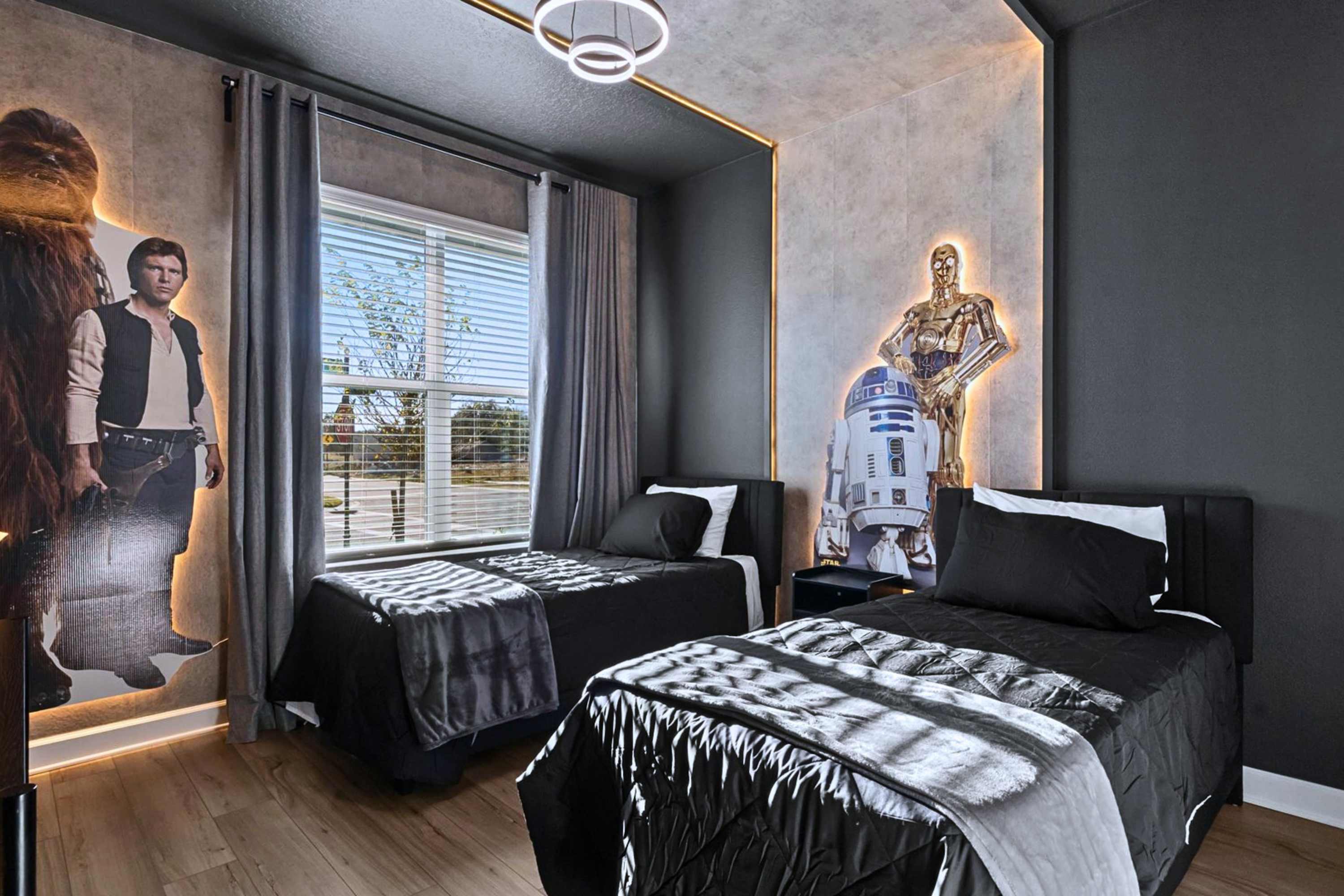 Fun themed twin room – A cool, cinematic space featuring twin beds and immersive décor for a memorable stay.