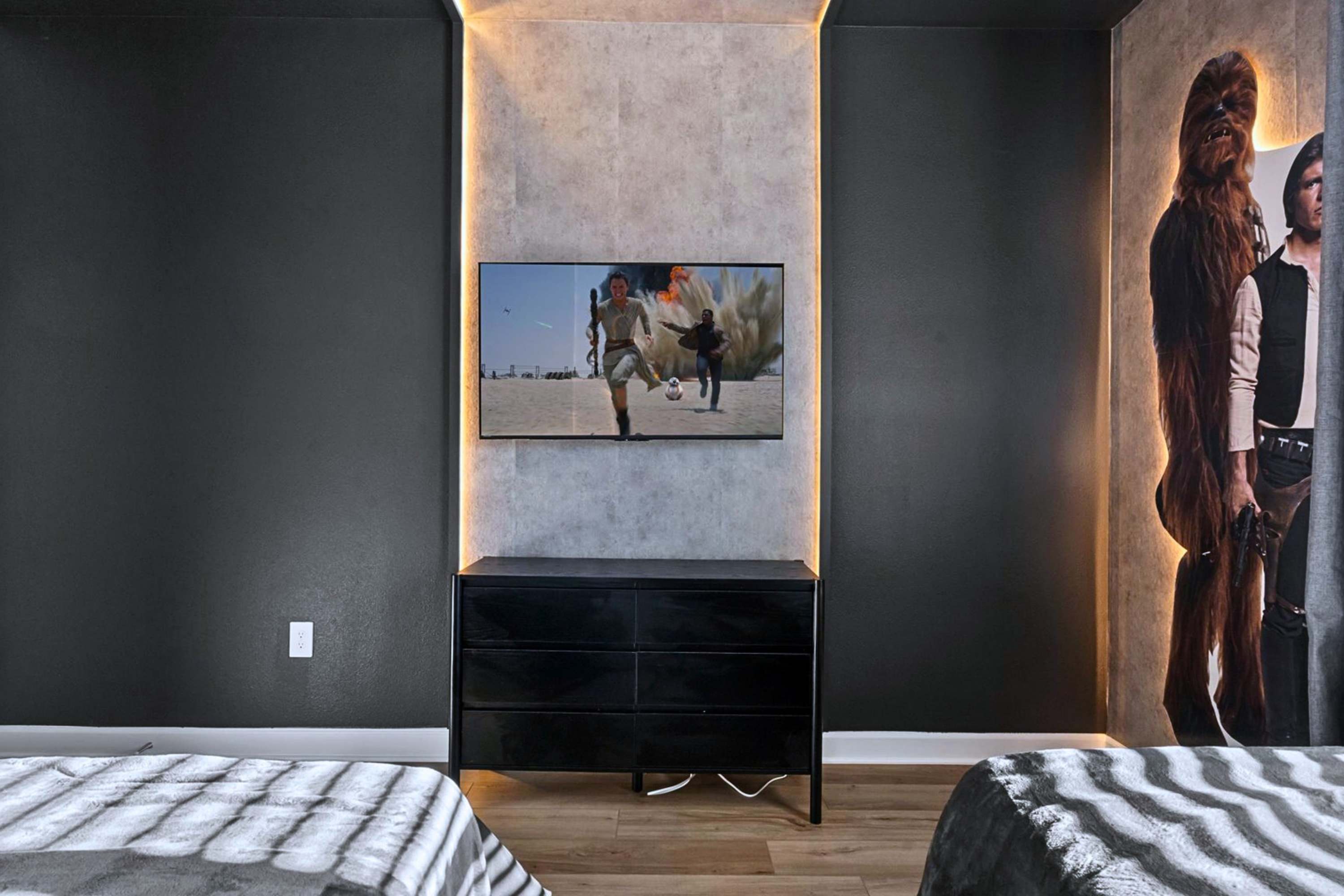 Spacious and thoughtfully styled twin bedroom for comfort with a smart TV