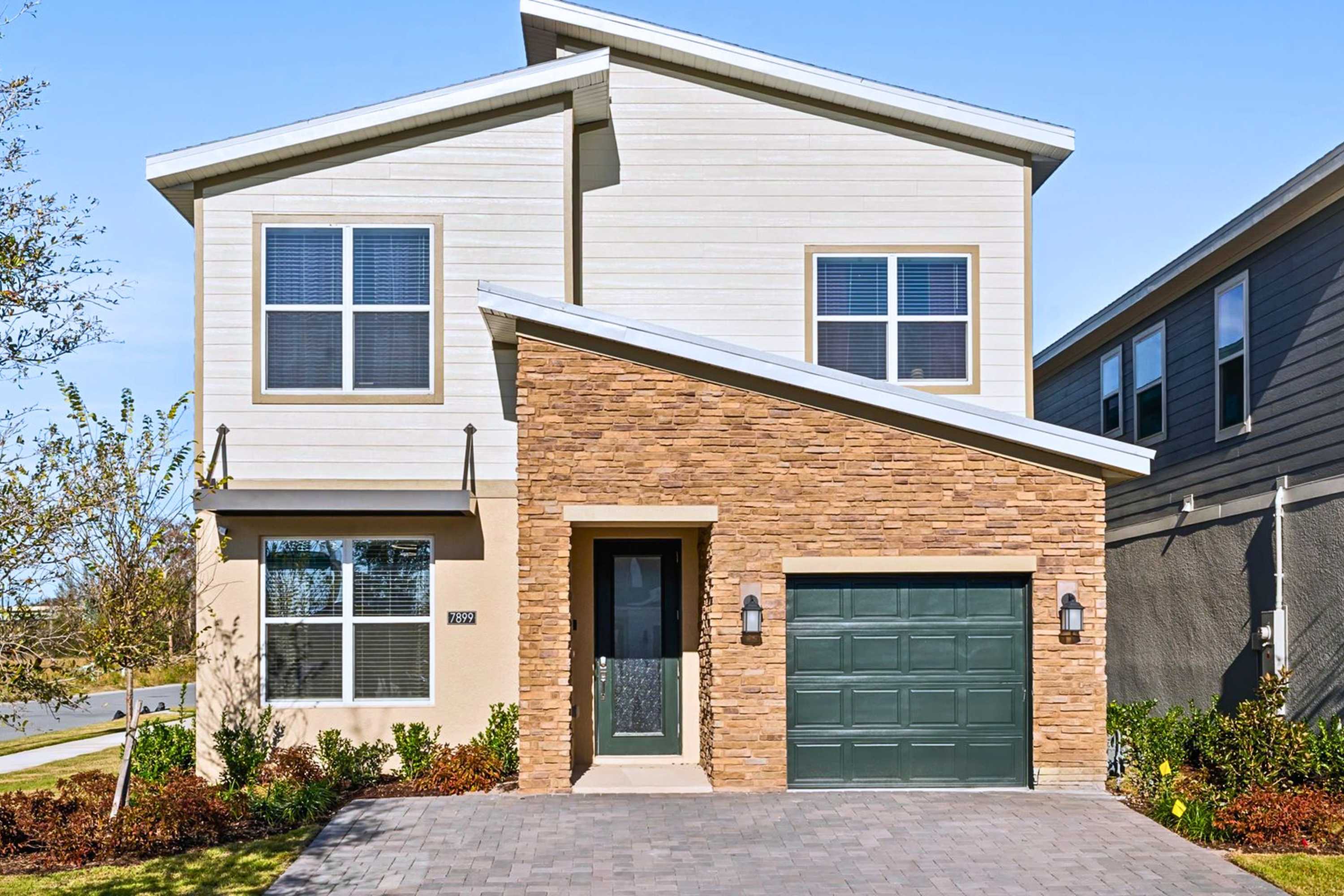 Beautiful exterior & private entrance – A modern home with curb appeal, private driveway, and easy access