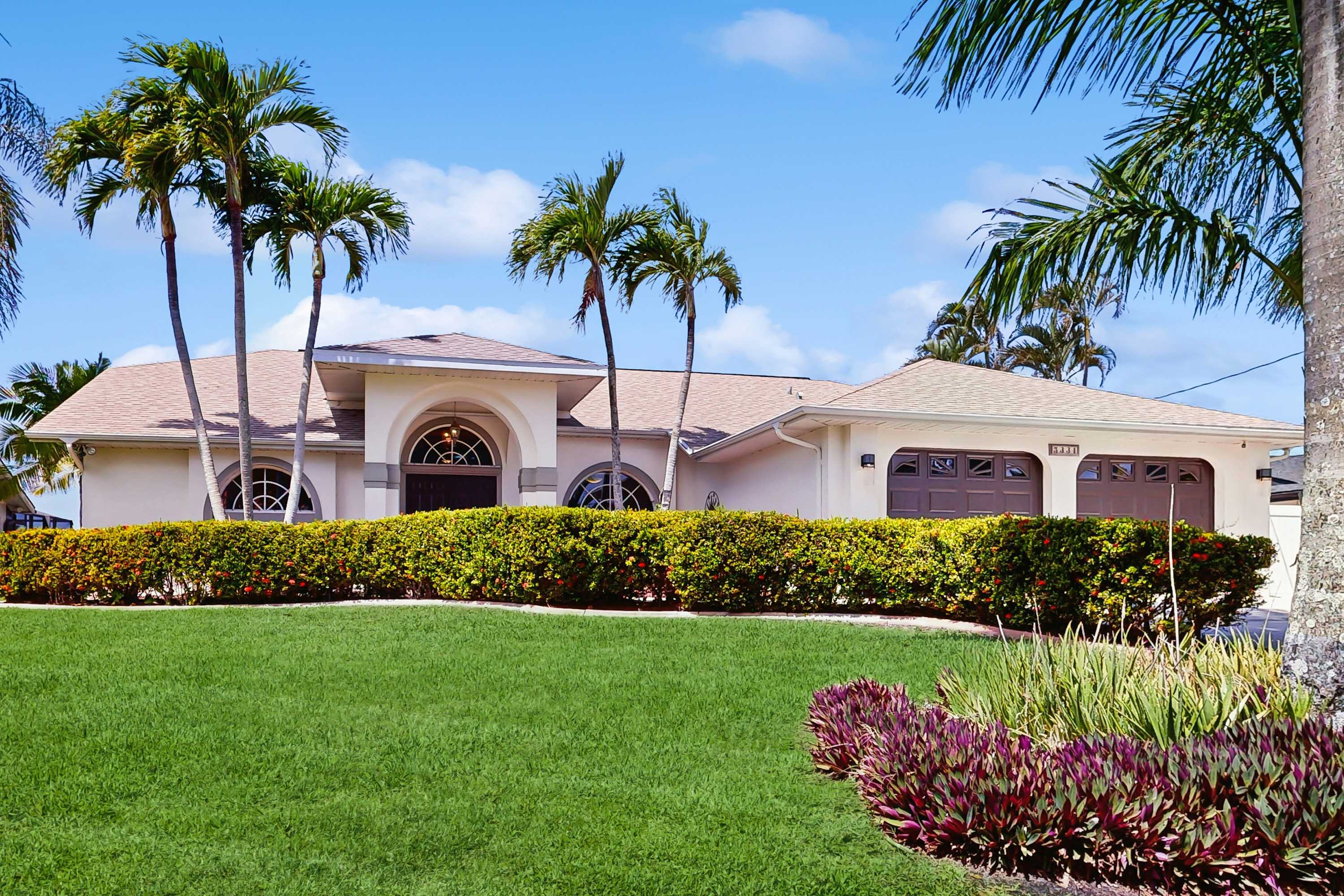 Waterfront home with private heated pool dock & lanai