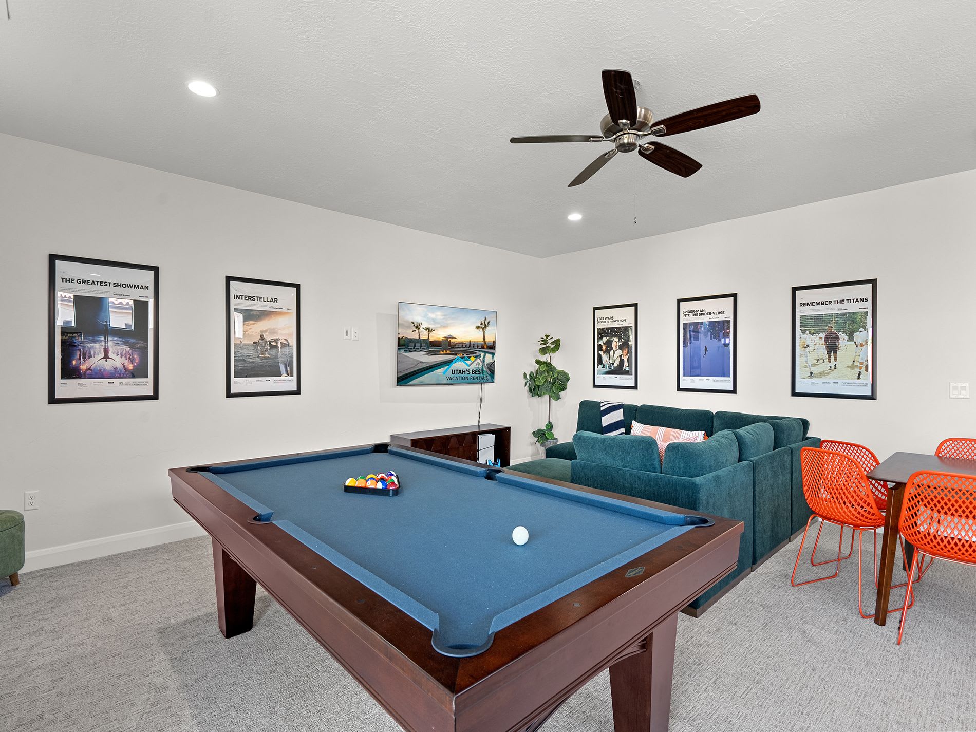 Comfortable living room upstairs with plush sectional seating and bright decor