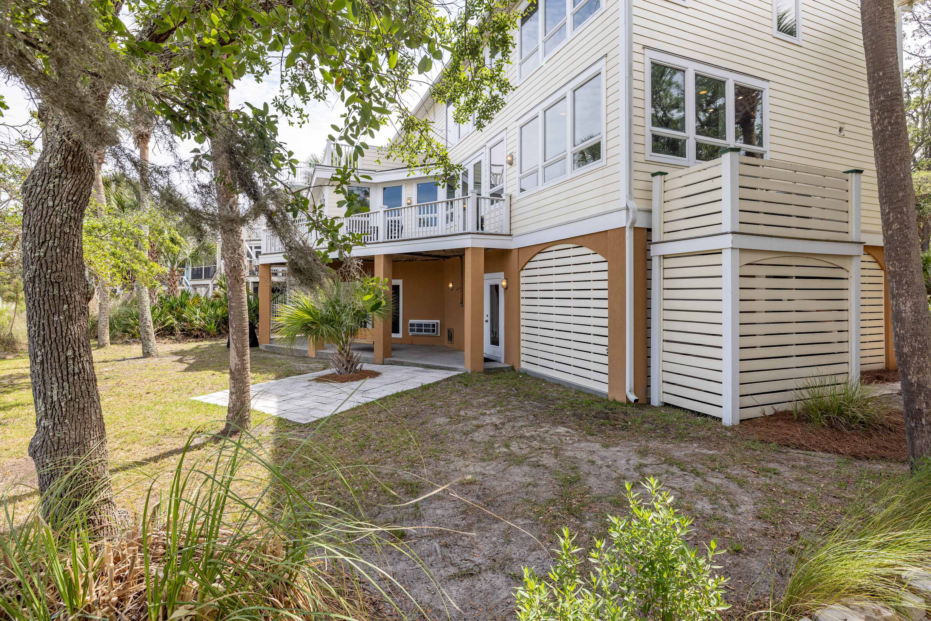 Backyard with Grill, Swing, Outdoor Shower and Access to Game Room and Sitting Room