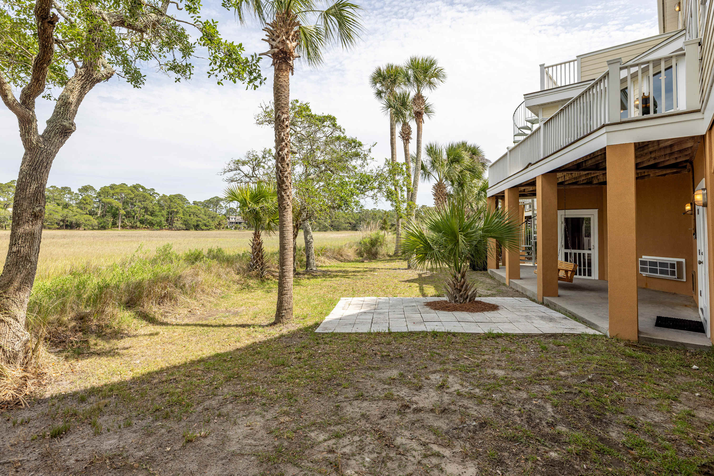 Backyard with Grill, Swing, Outdoor Shower and Access to Game Room and Sitting Room