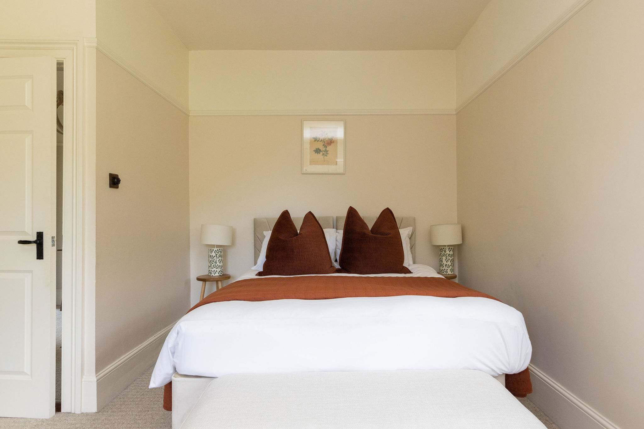 Warm and inviting bedroom with a peaceful atmosphere.