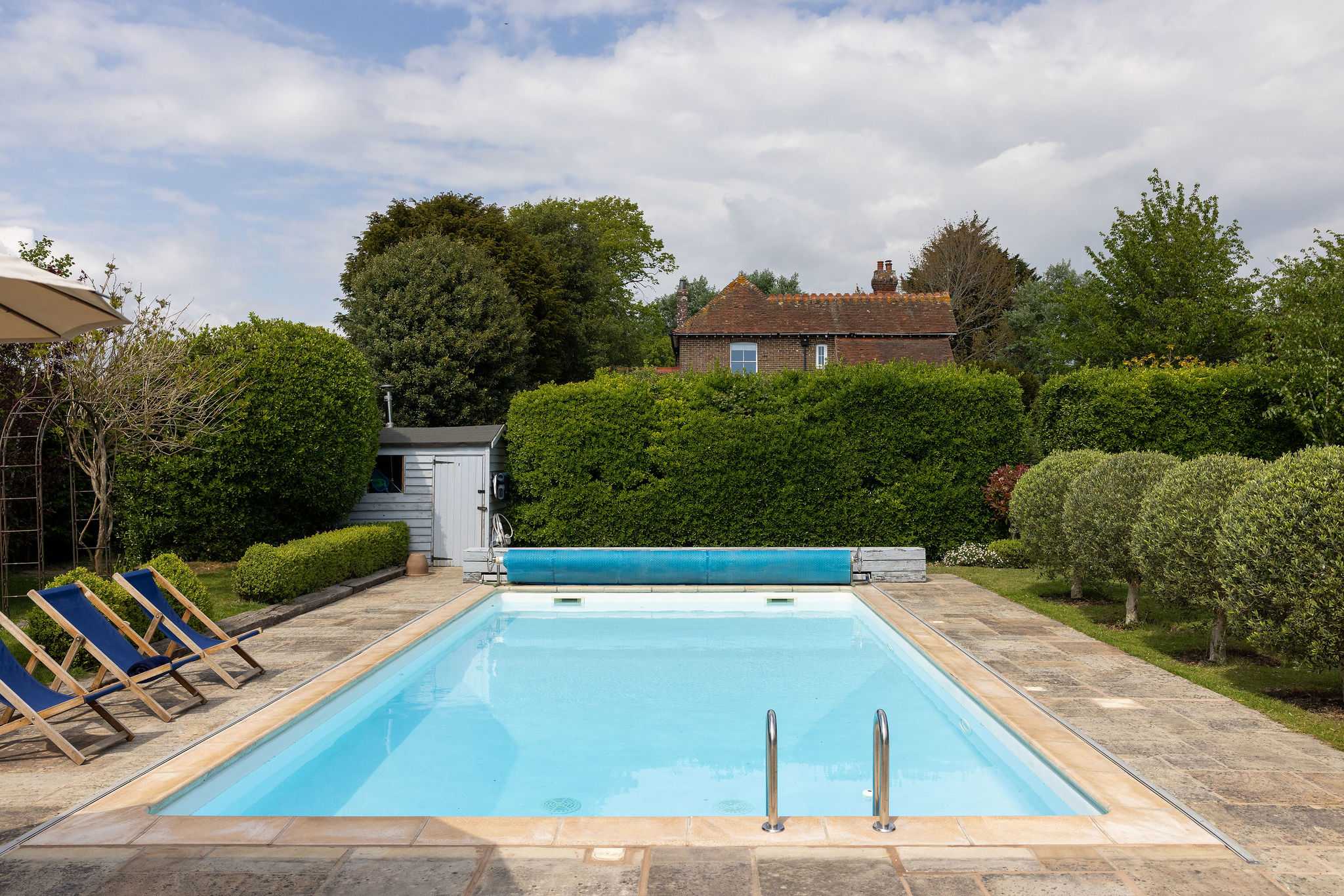 Heated swimming pool with plenty of space to unwind.