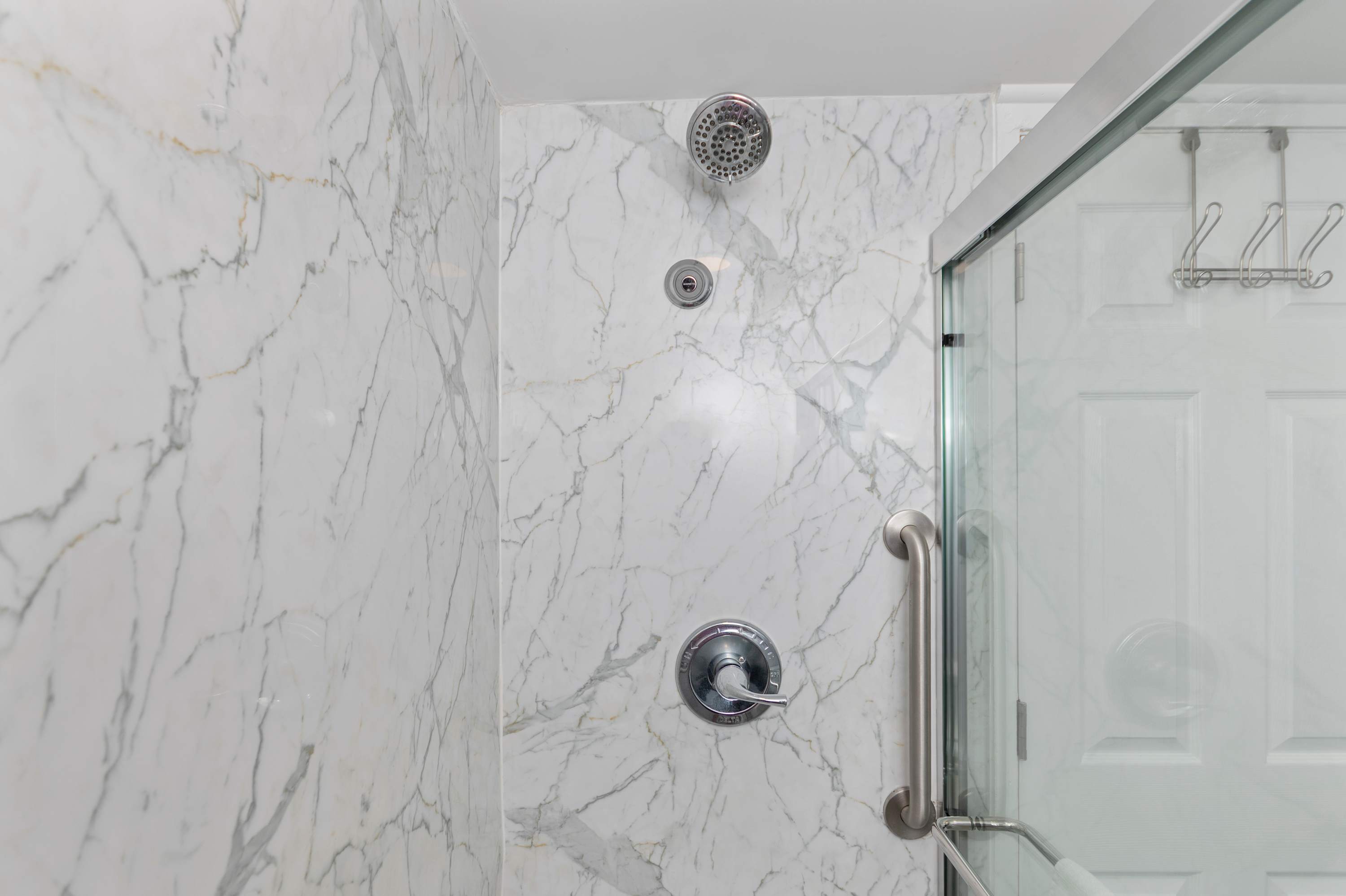 Refresh and unwind in a clean, comfortable bathroom designed with guest comfort in mind.