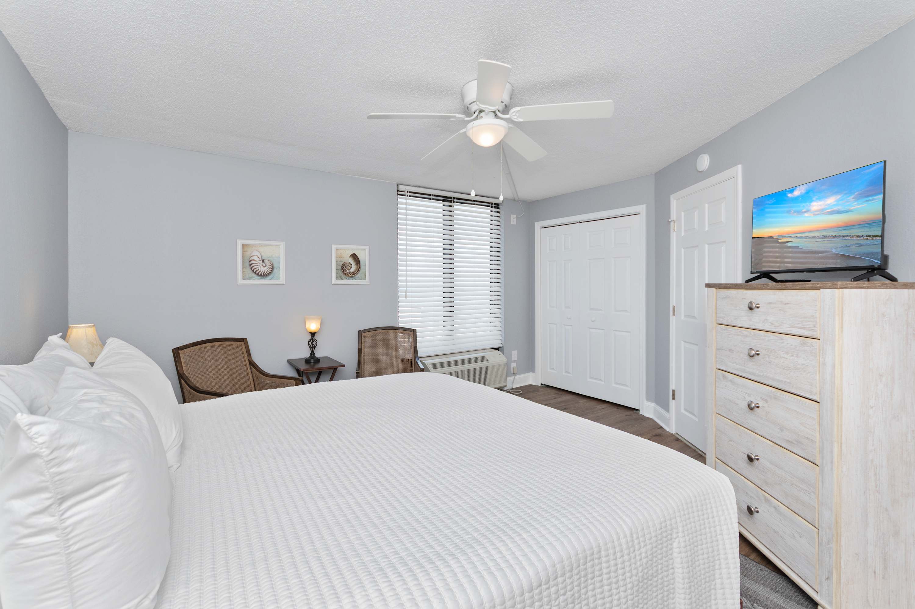 Wake up refreshed in a bright, airy bedroom designed for rest, relaxation, and peaceful beach mornings.