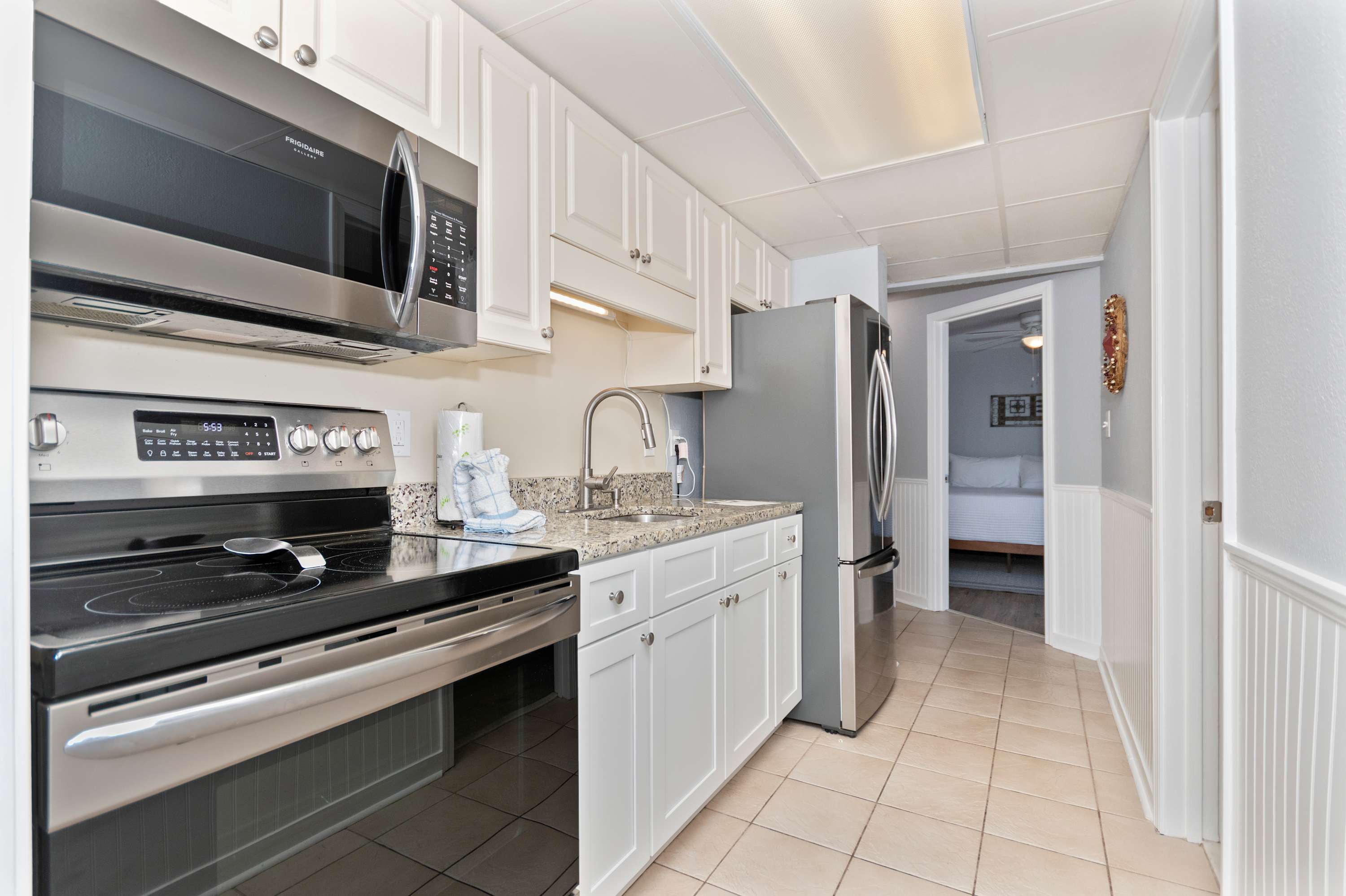 Prepare beach snacks, morning coffee, or family dinners in this clean and welcoming kitchen.