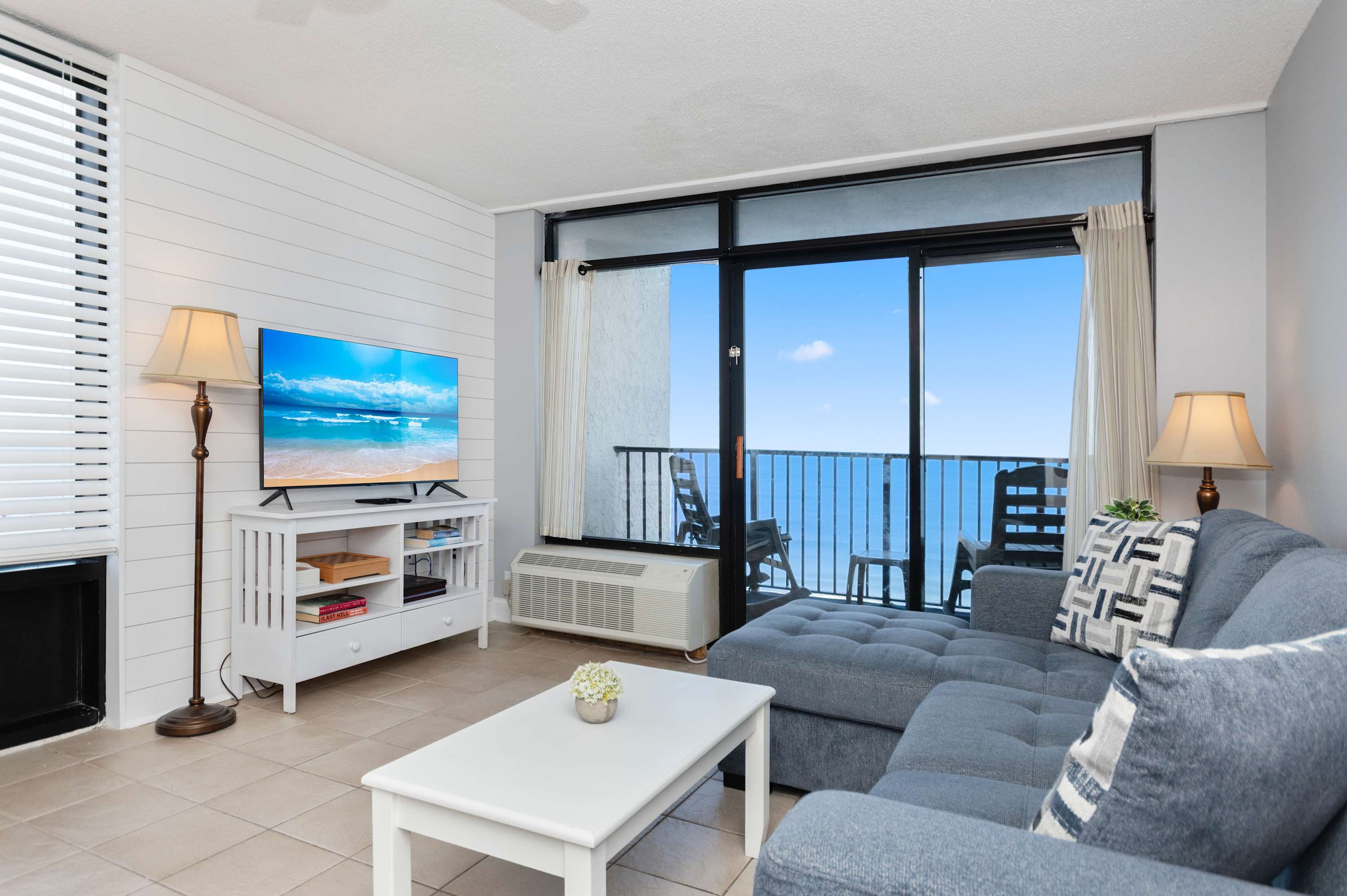 Relax and unwind in this cozy living room after a fun-filled Myrtle Beach beach day.