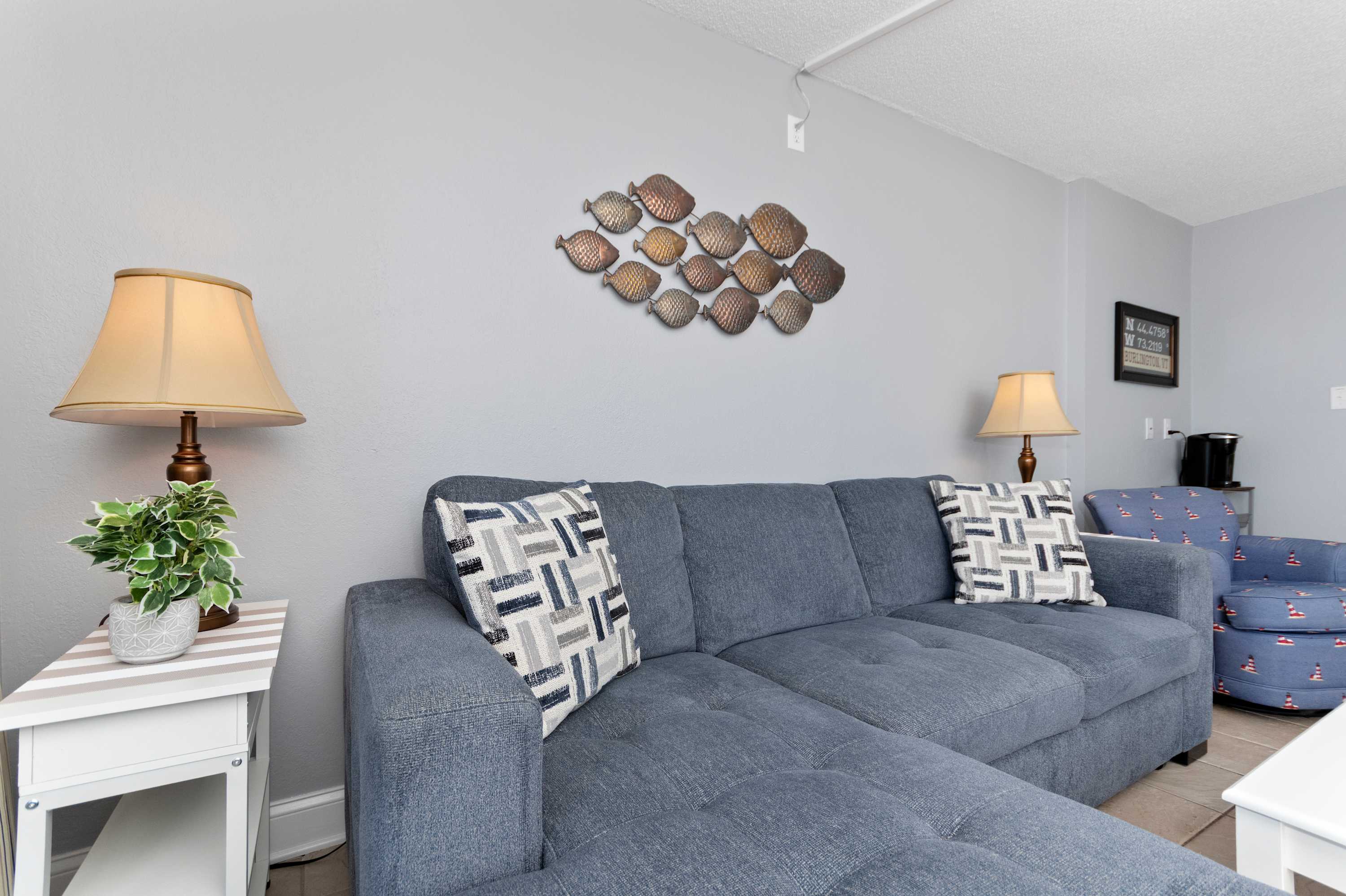 This spacious living room offers comfort, style, and the perfect relaxing vacation atmosphere.