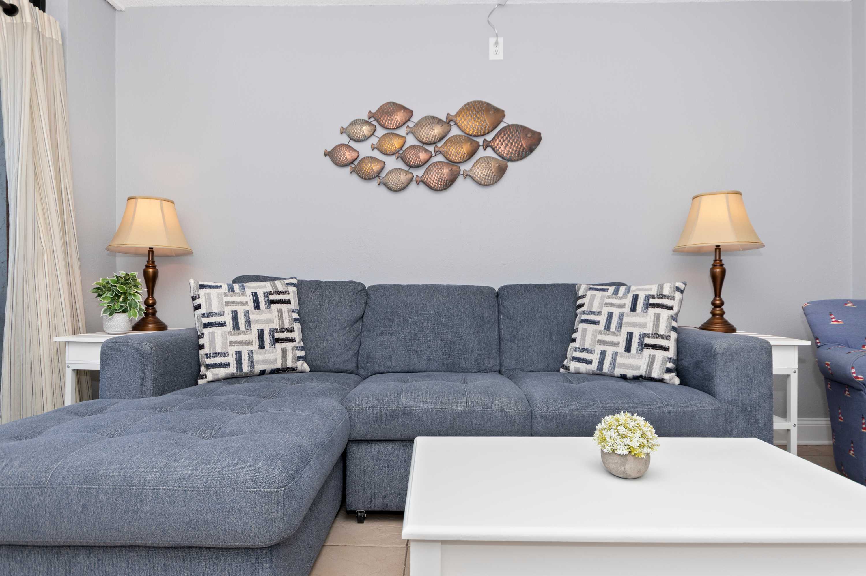 Enjoy movie nights, morning coffee, and relaxing evenings in this inviting living area.
