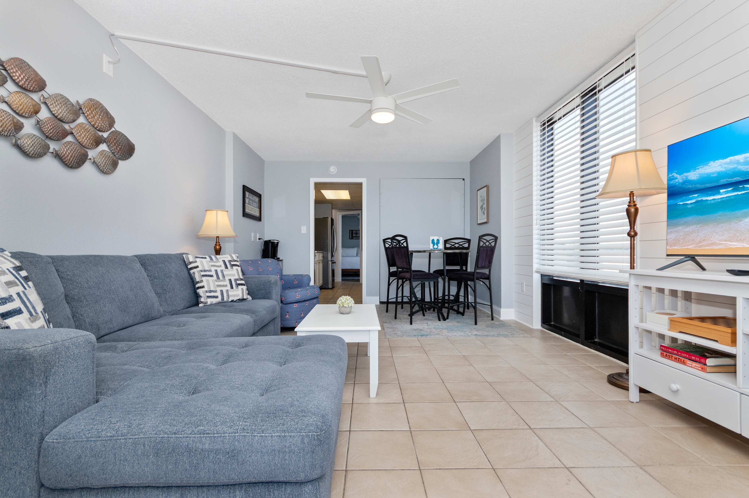 Coastal décor and comfortable seating create the perfect vacation gathering space.