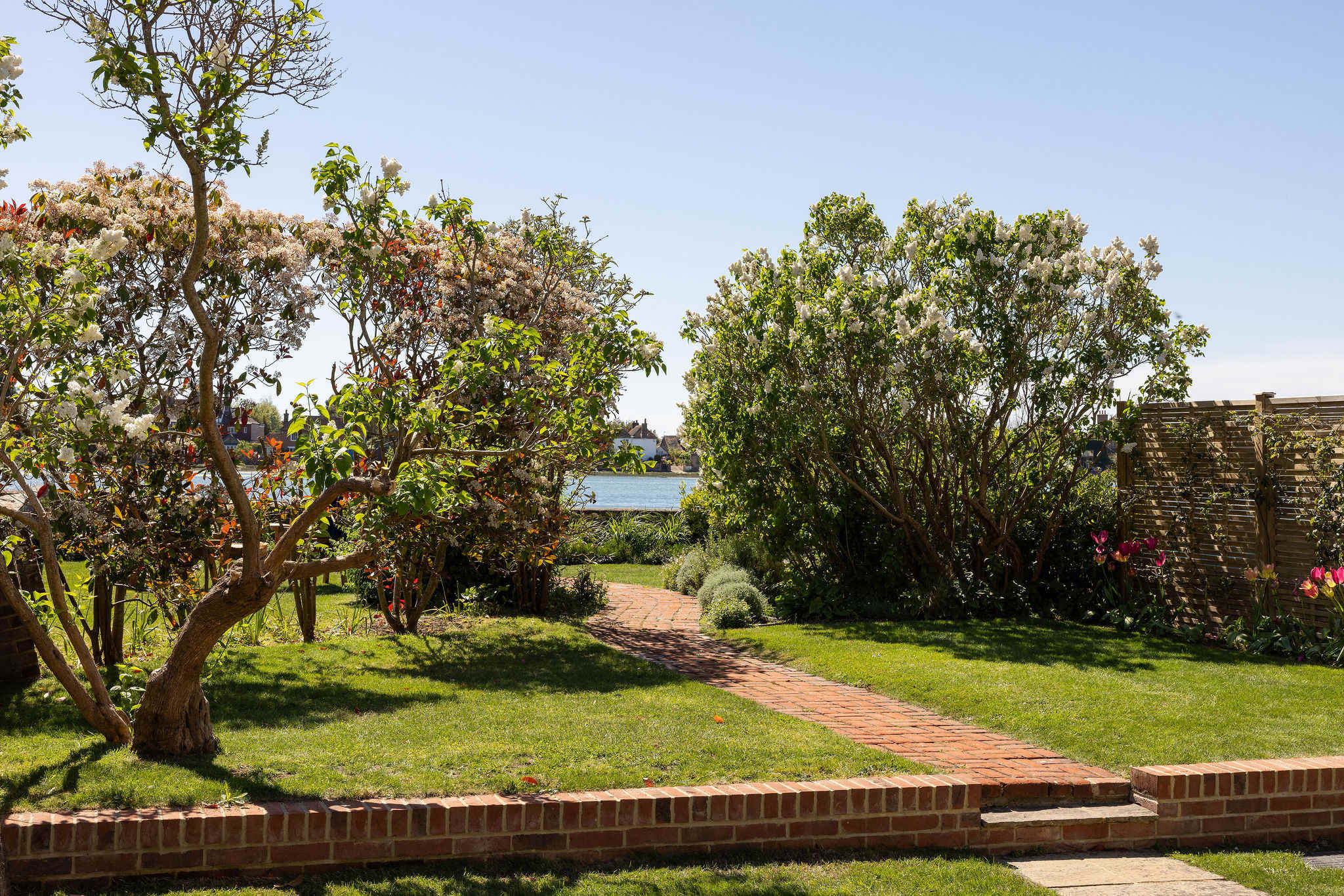 Garden path leading towards the water