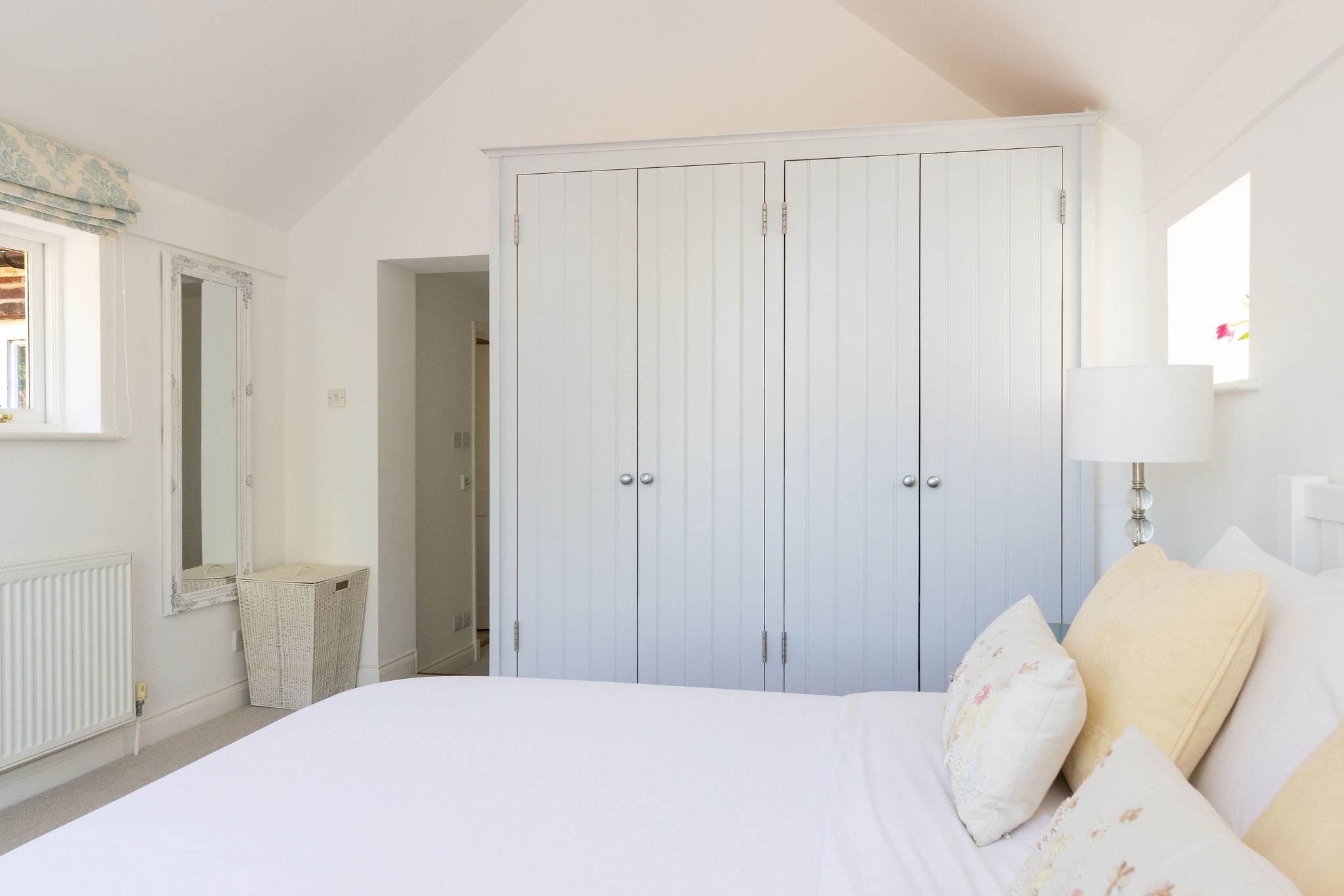 Bedroom storage and soft natural light