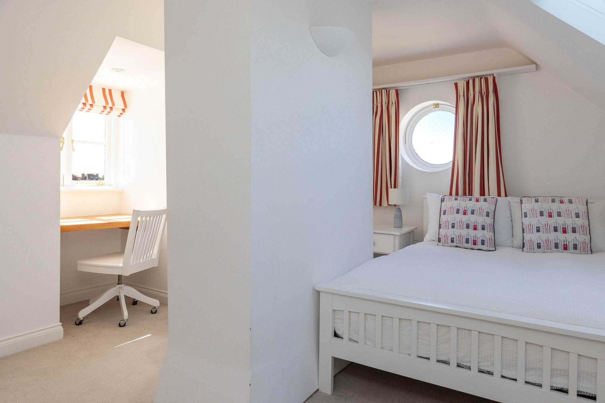Top-floor bedroom with desk space