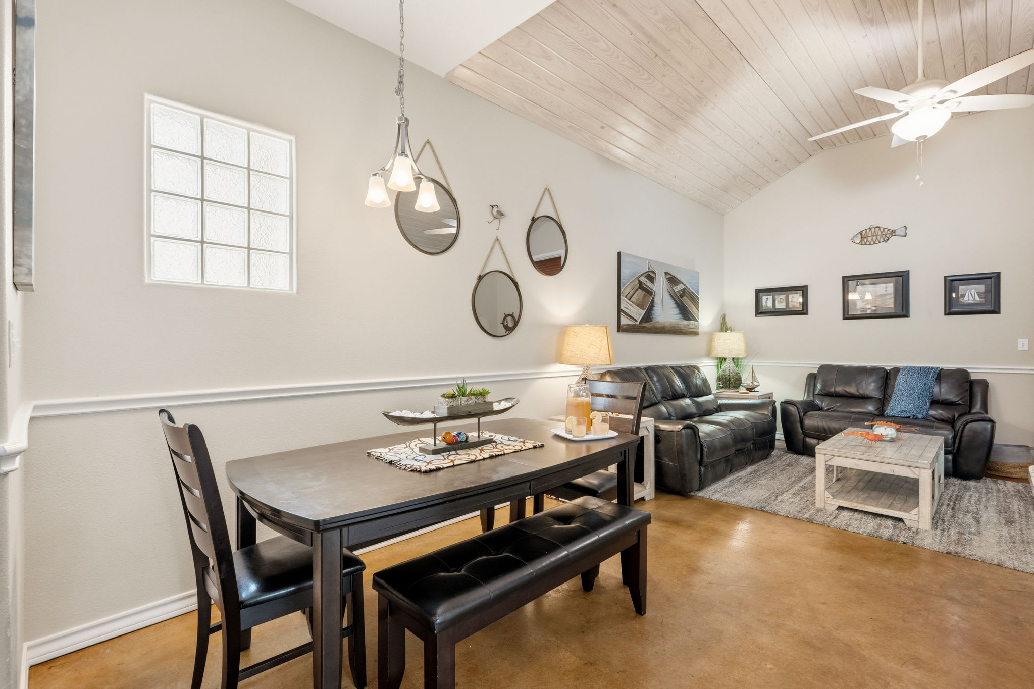 Dining Area with Pendant Lighting & Vaulted Ceiling