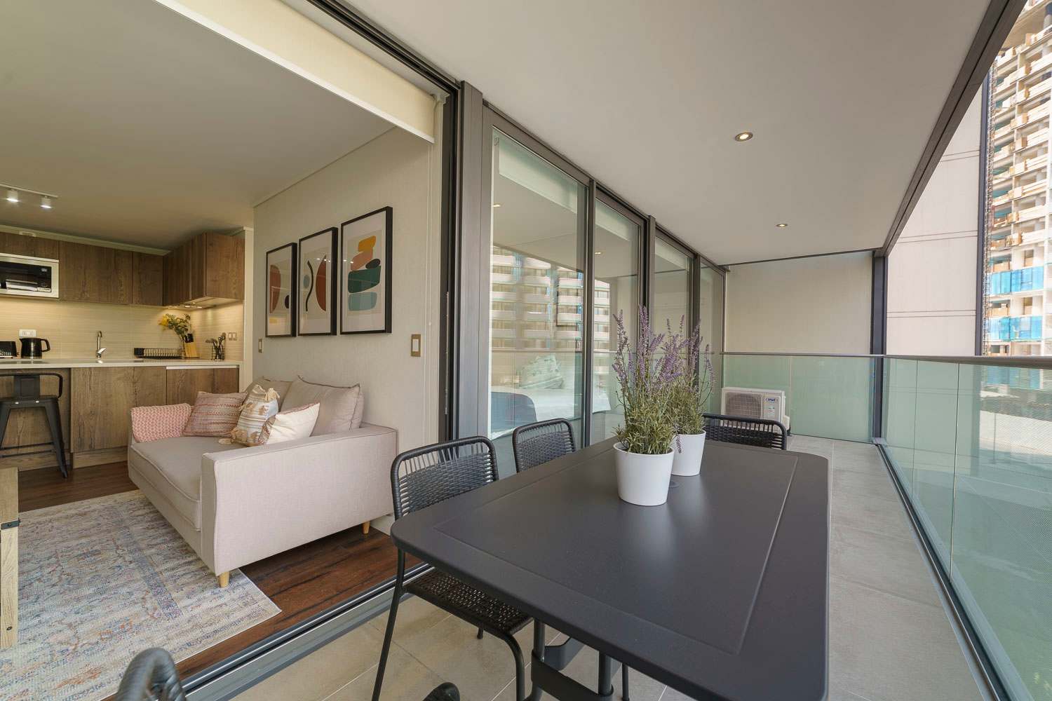 Enjoy city views from your private balcony, perfect for dining and relaxation.