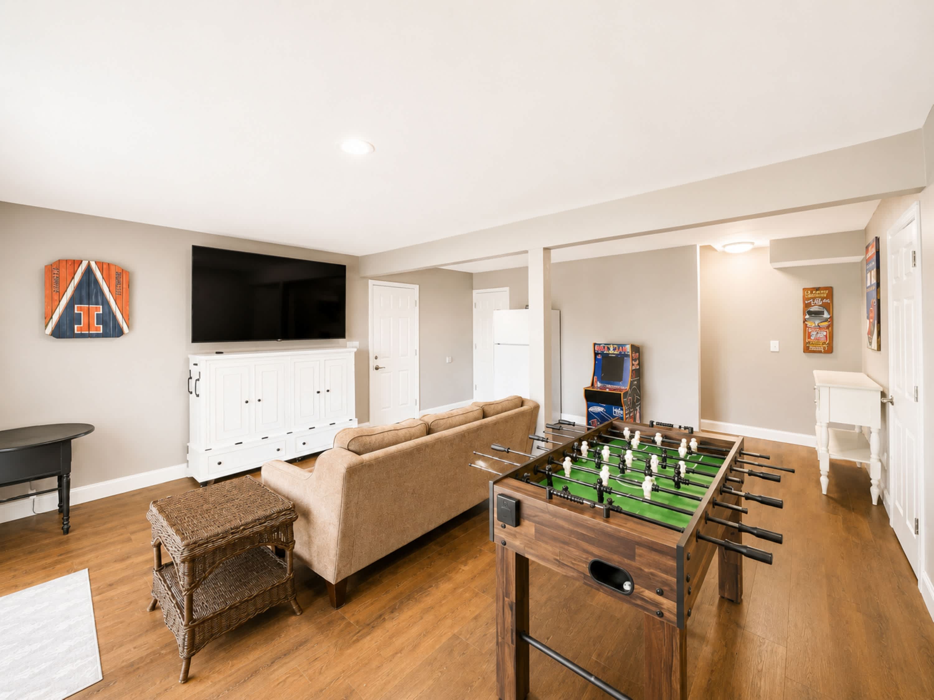 The lower-level game room is ideal for family game & movie nights​