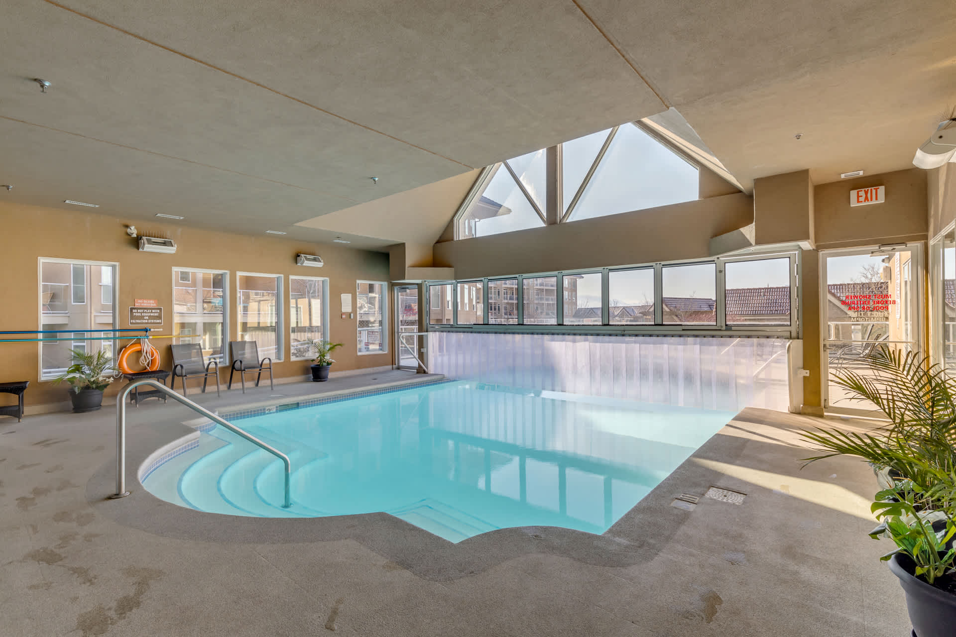 Indoor/Outdoor Pool | Discovery Bay 108 in Kelowna, British Columbia by Luxus Vacation Properties