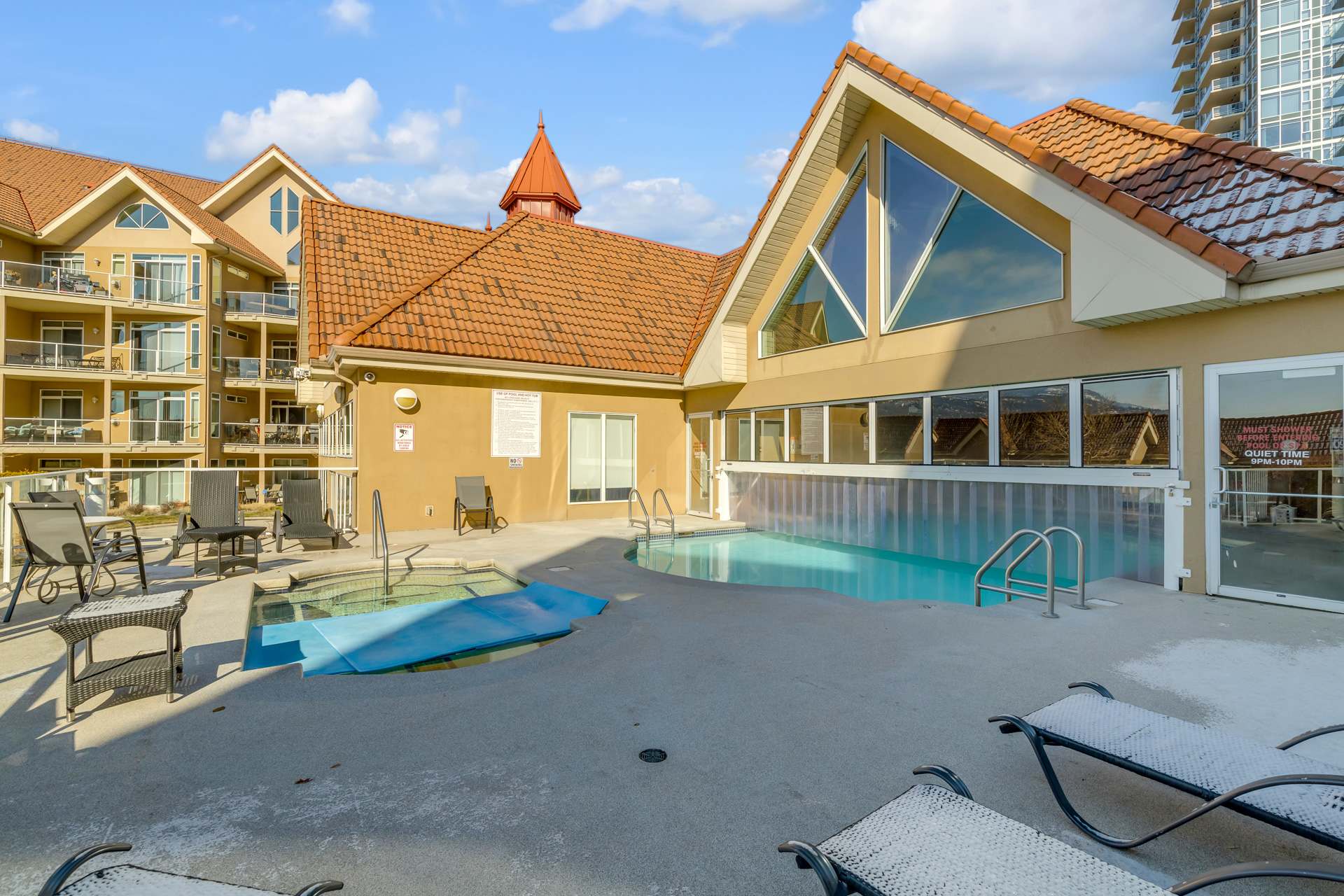 Indoor/Outdoor Pool | Discovery Bay 108 in Kelowna, British Columbia by Luxus Vacation Properties