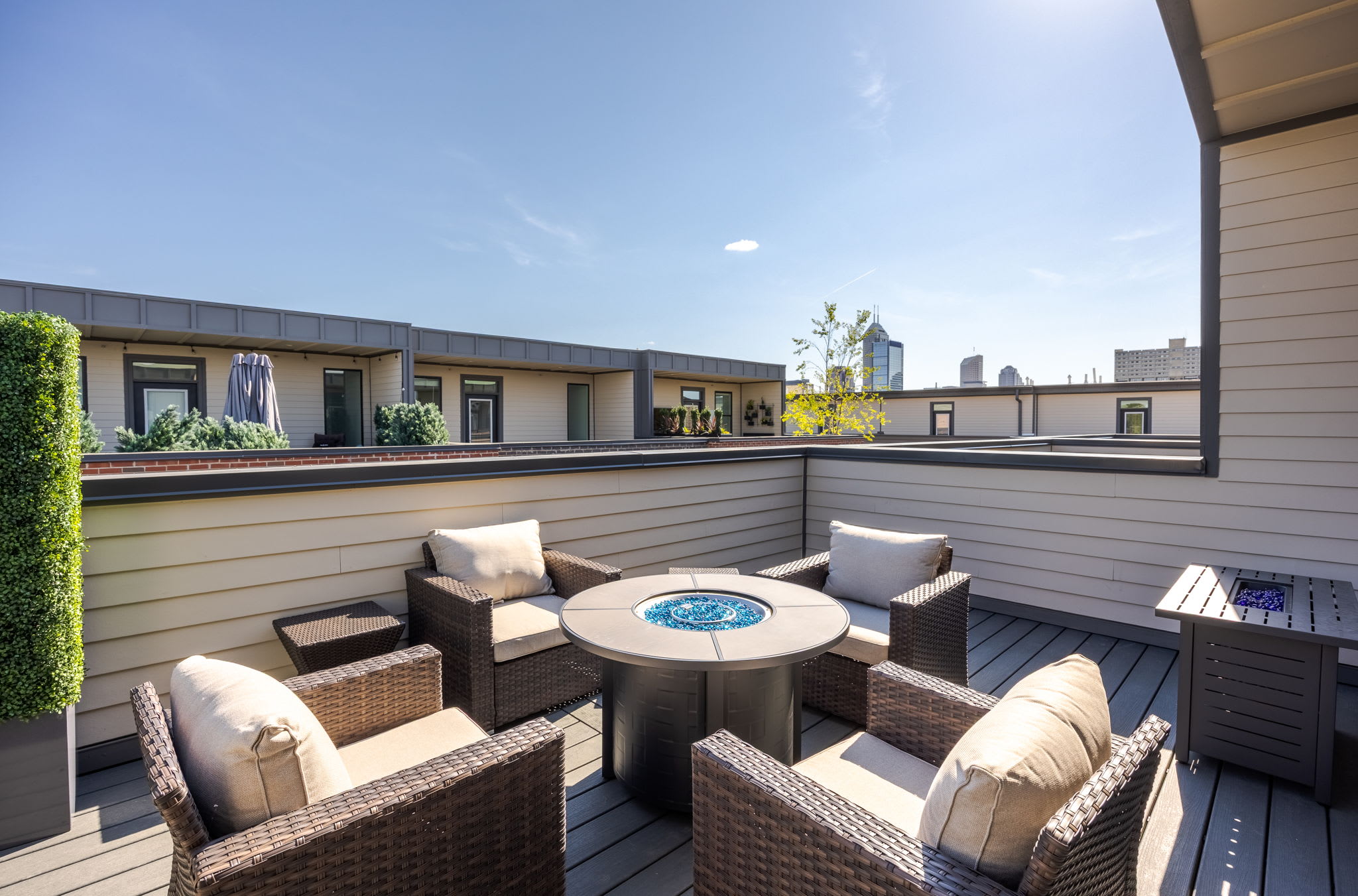 Rooftop Oasis with Fire Feature | Elevated Outdoor Living with Space to Relax + Entertain