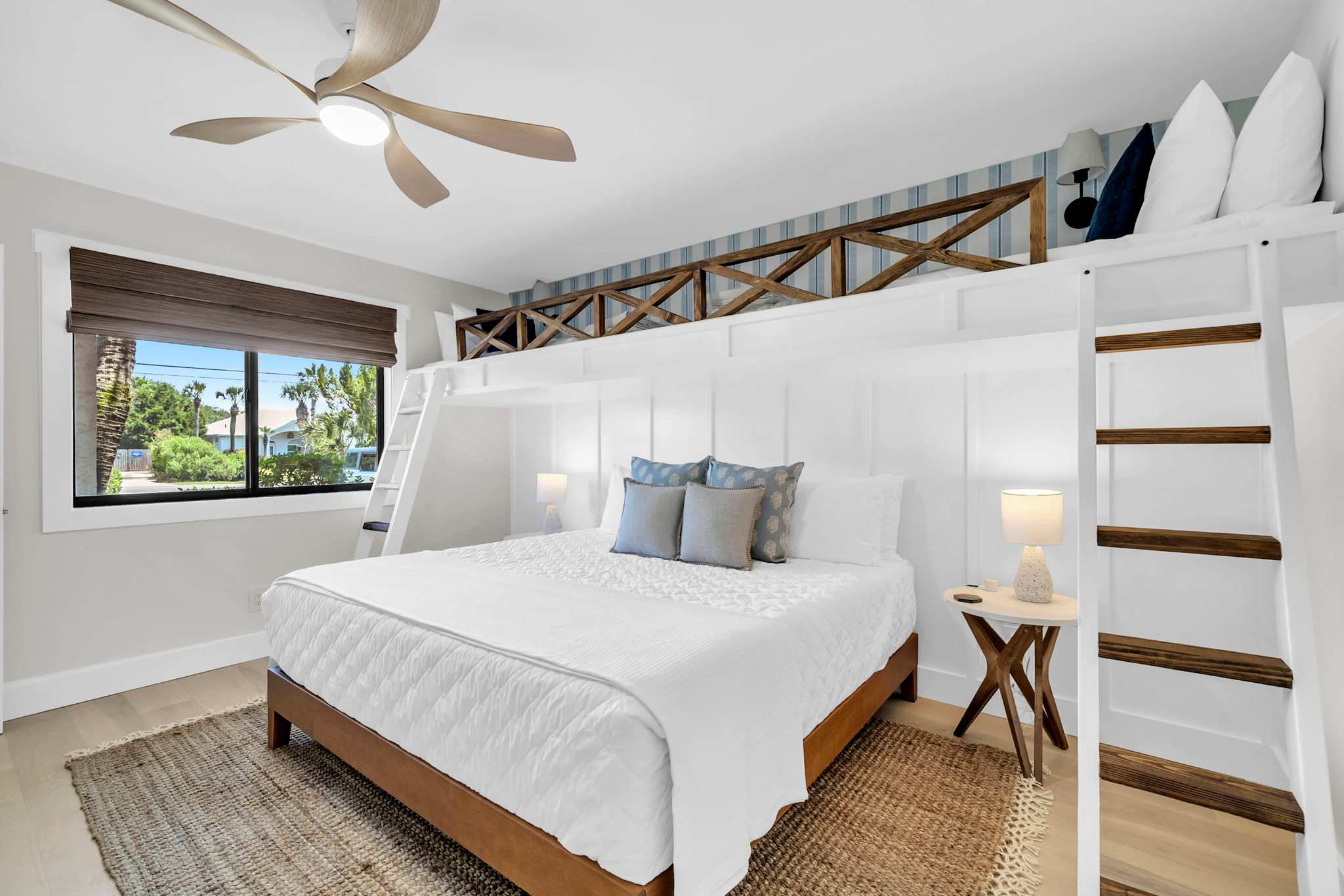 Guest bedroom features built-in overhead twin beds 