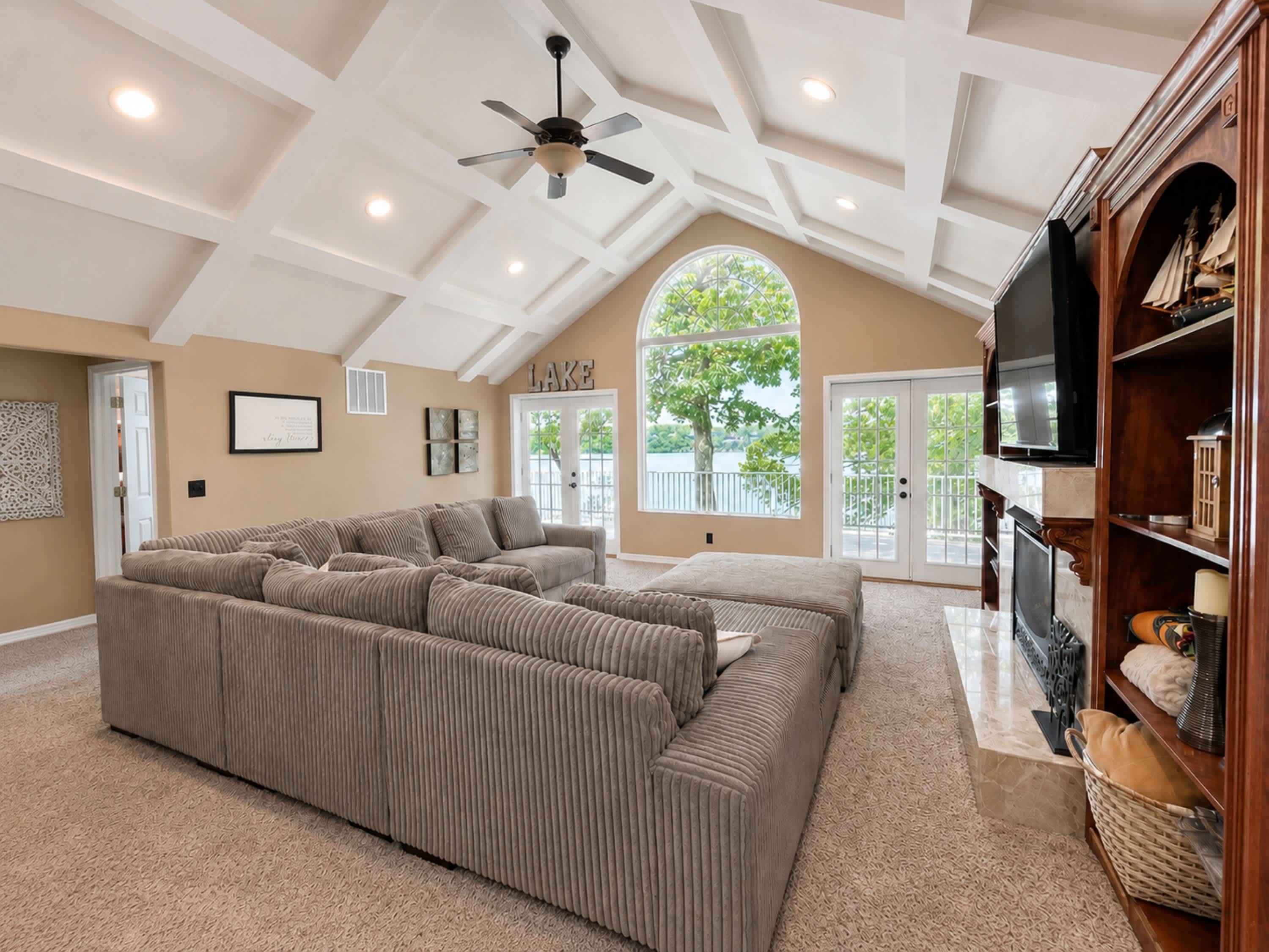 Unwind in the airy living room & stream your favorites on the smart TV​