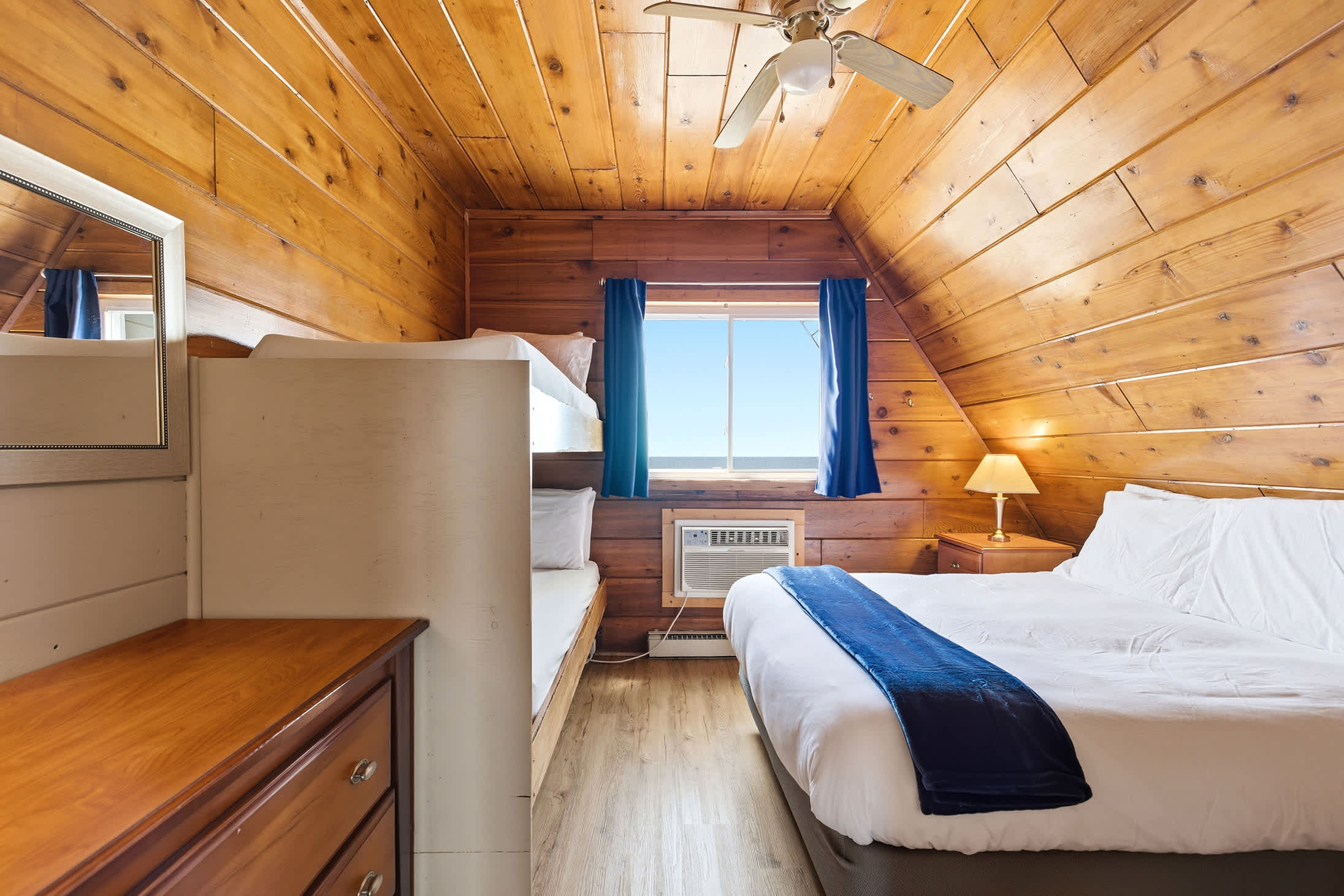 Bedroom 1 is located on the 2nd floor and has a queen and single bunk bed.